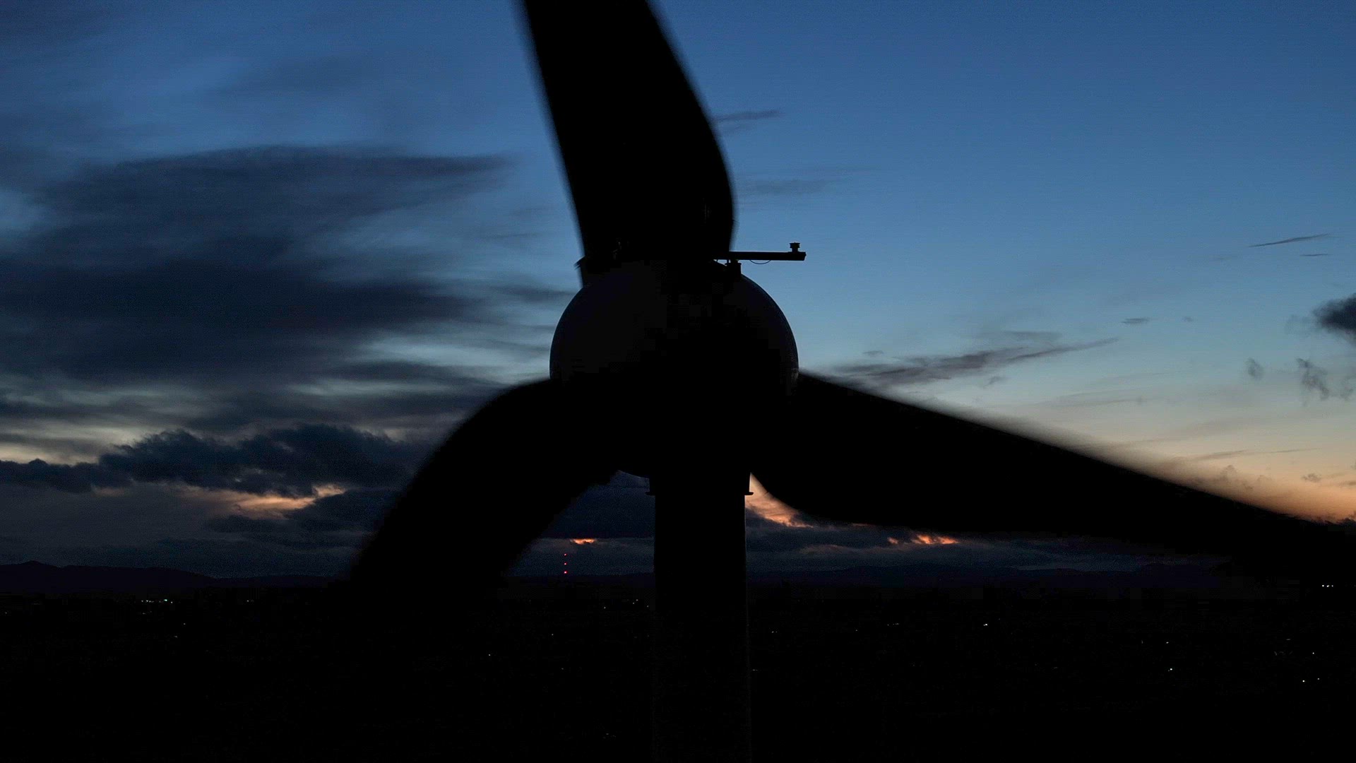 Wind Farm Turbines Generating Renewable Energy Through the Night