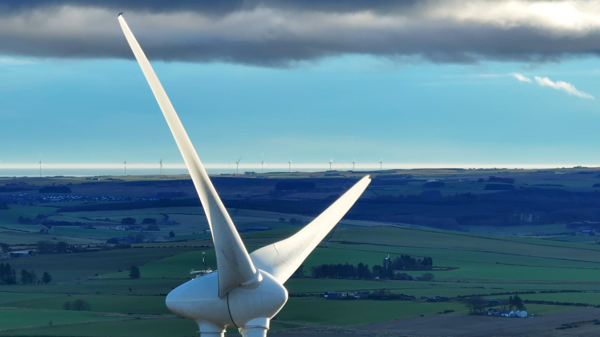 Onshore Wind Farm Turbines in the Countryside Generating Renewable Energy
