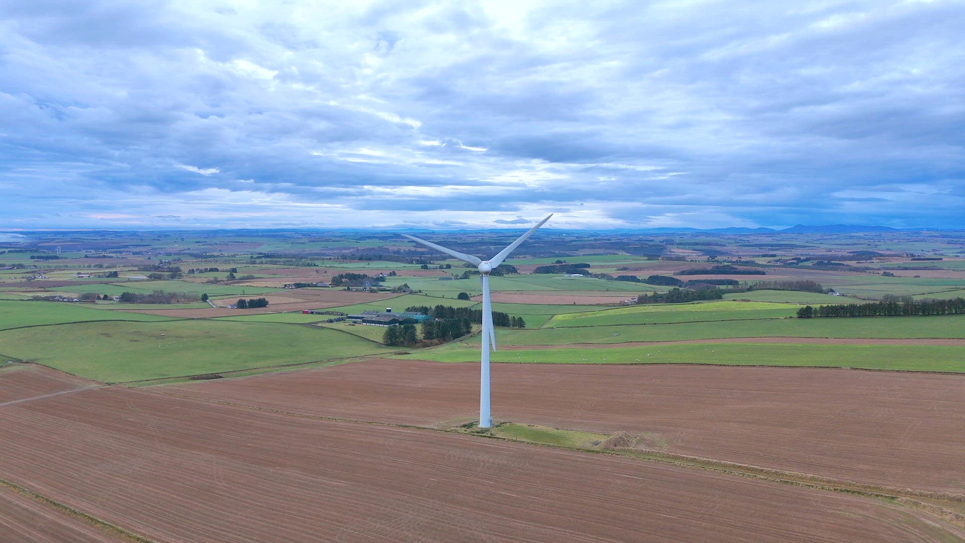 Onshore Wind Farm Turbines in the Countryside Generating Renewable Energy
