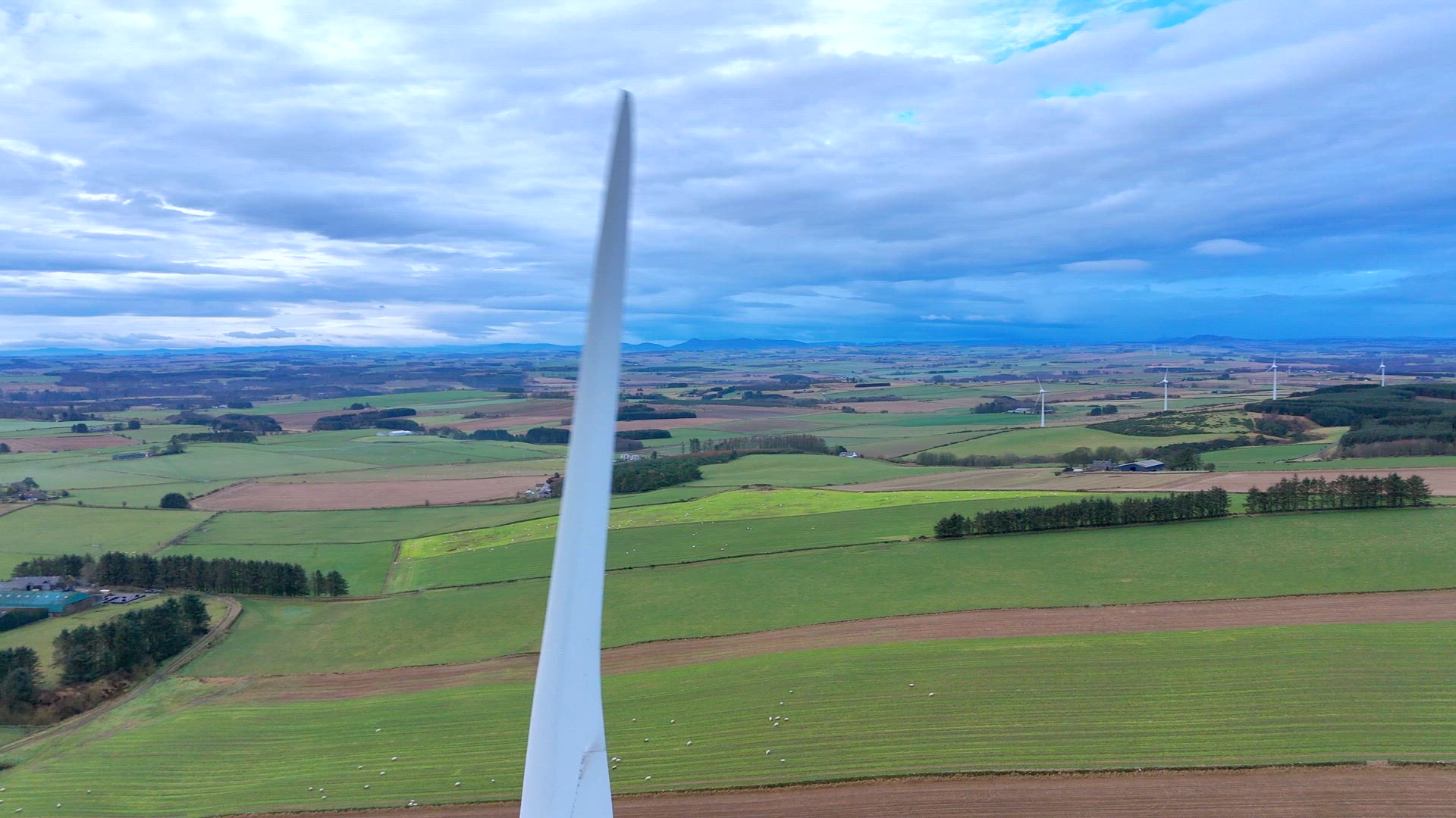 Onshore Wind Farm Turbines in the Countryside Generating Renewable Energy