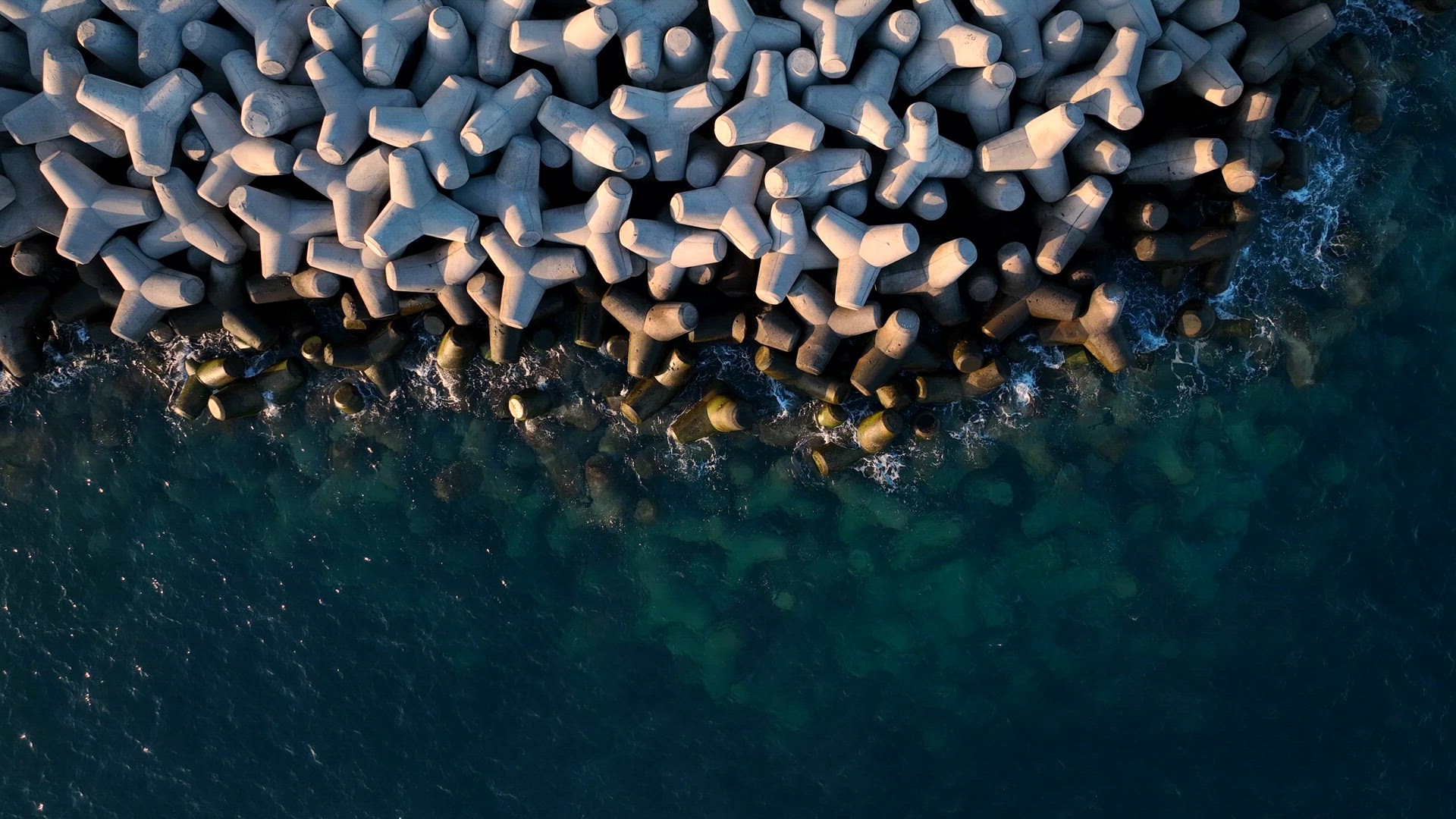 Tetrapod Concrete Breakwater Protecting the Coast from Erosion
