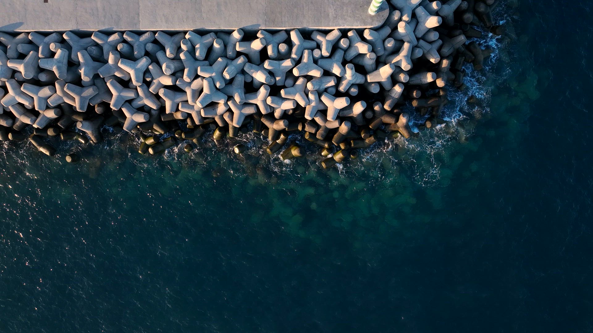Tetrapod Concrete Breakwater Protecting the Coast from Erosion