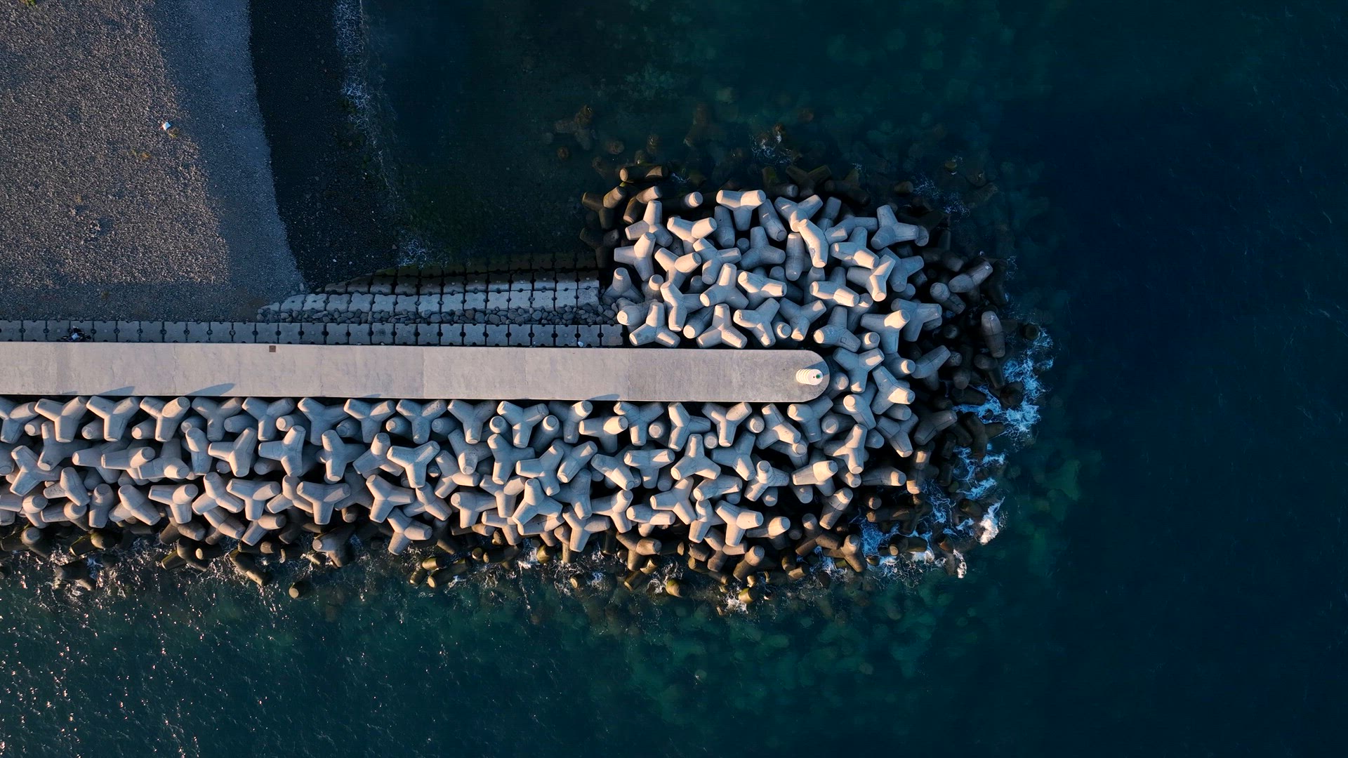 Tetrapod Concrete Breakwater Protecting the Coast from Erosion