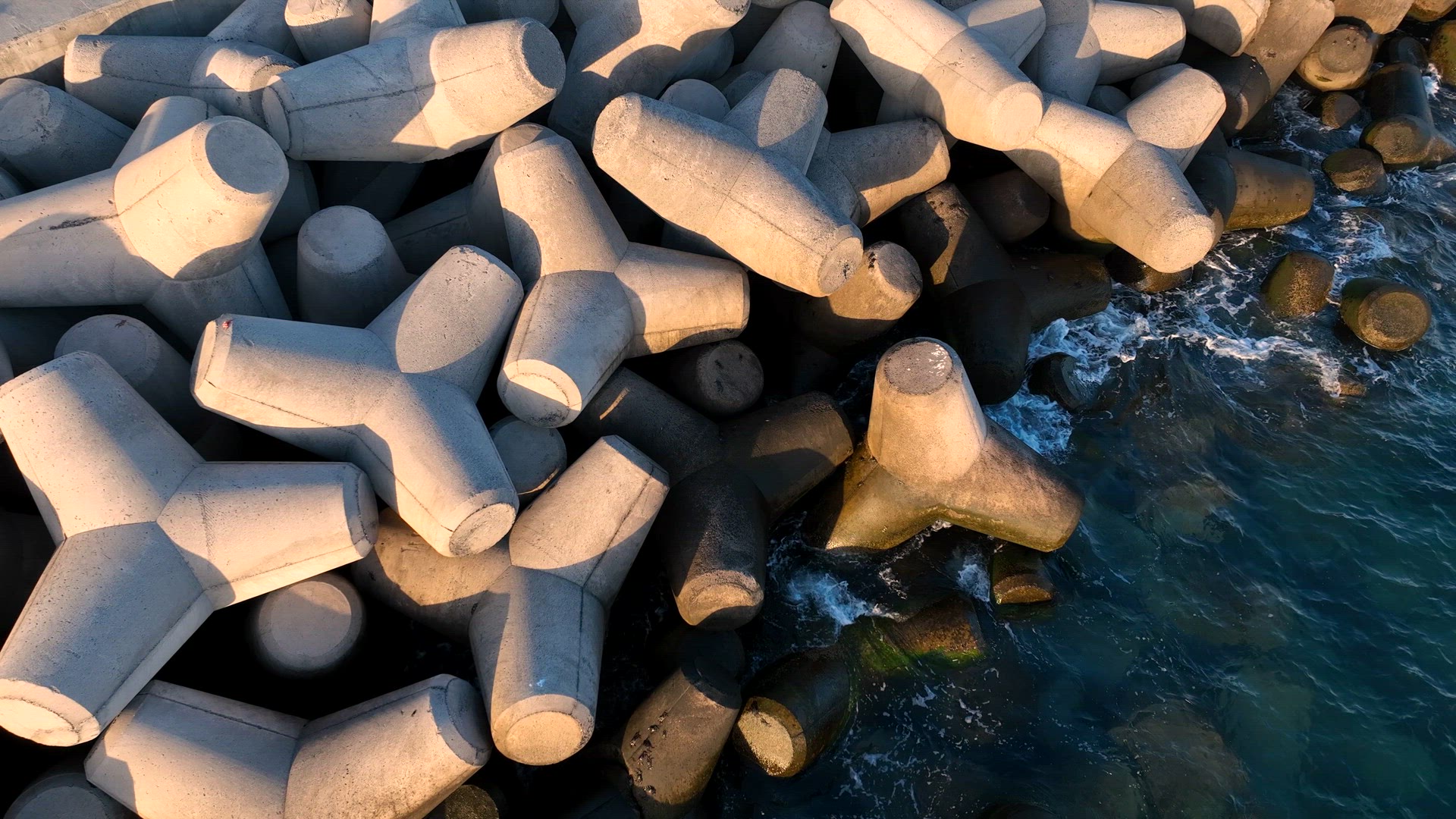 Tetrapod Concrete Breakwater Protecting the Coast from Erosion