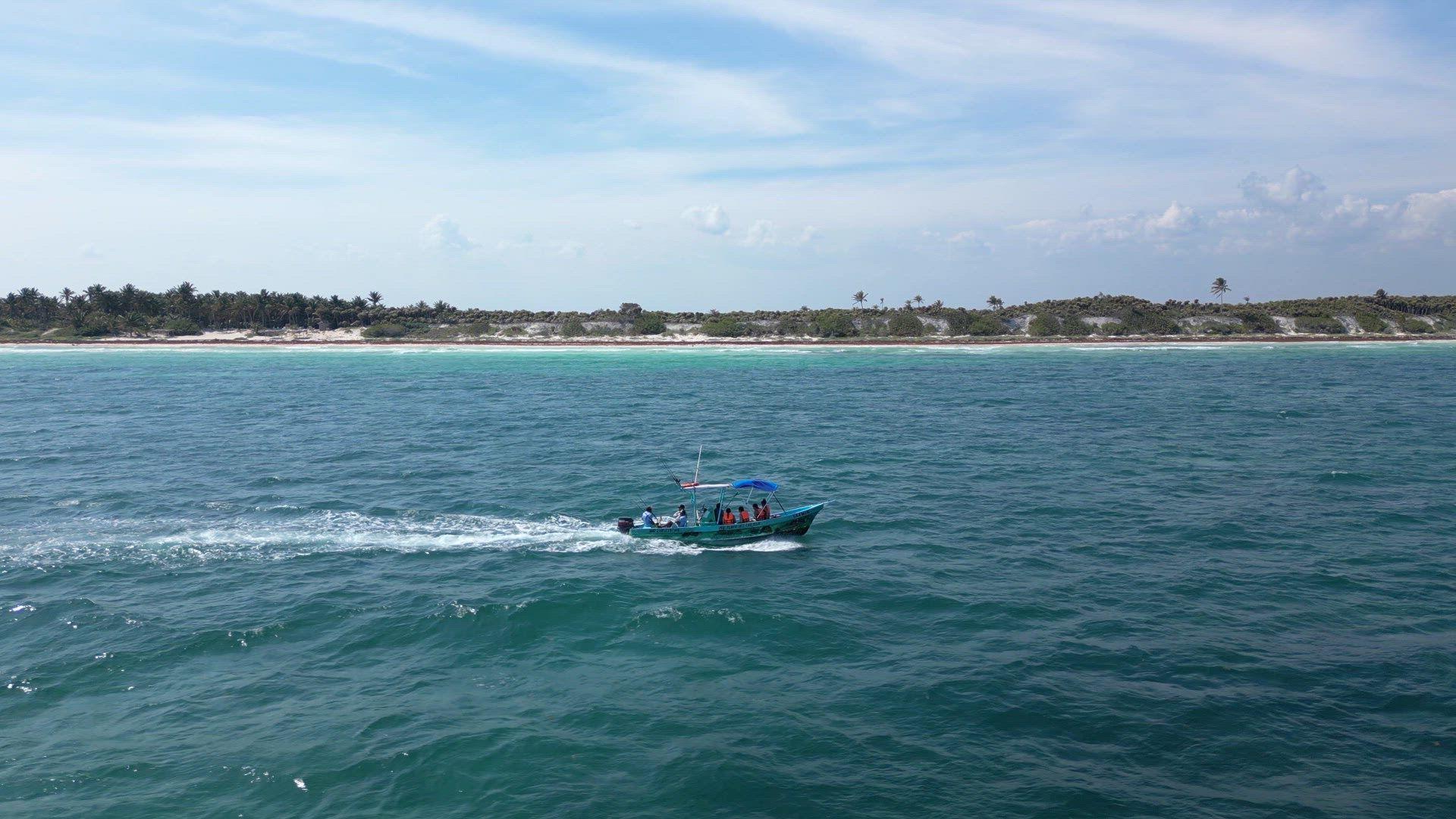 Fishing Tour Boat at Sea Taking Tourists out to Catch Fish in Mexico