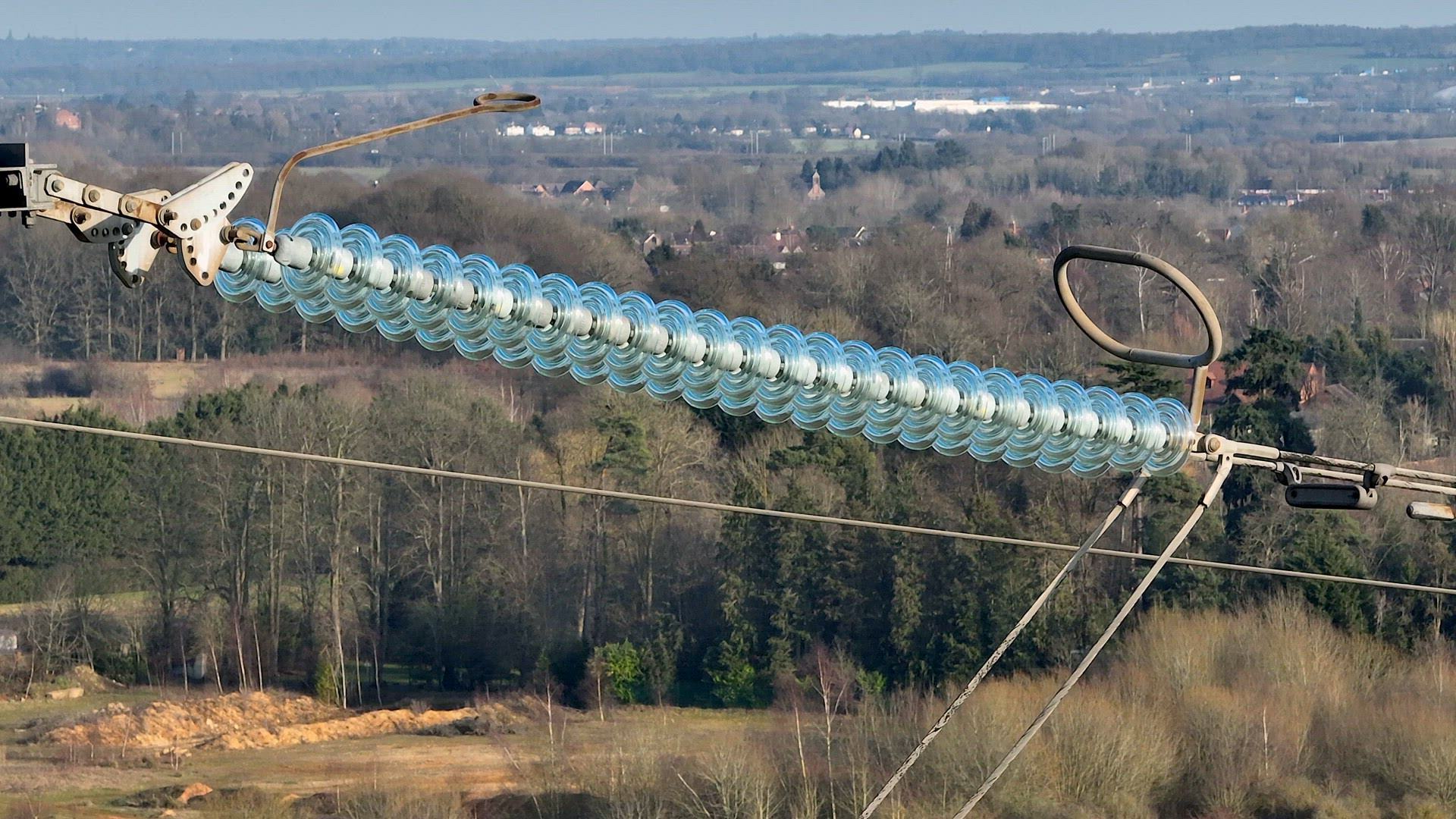 Close Up View of Industrial High Voltage Lattice Power Line Tower