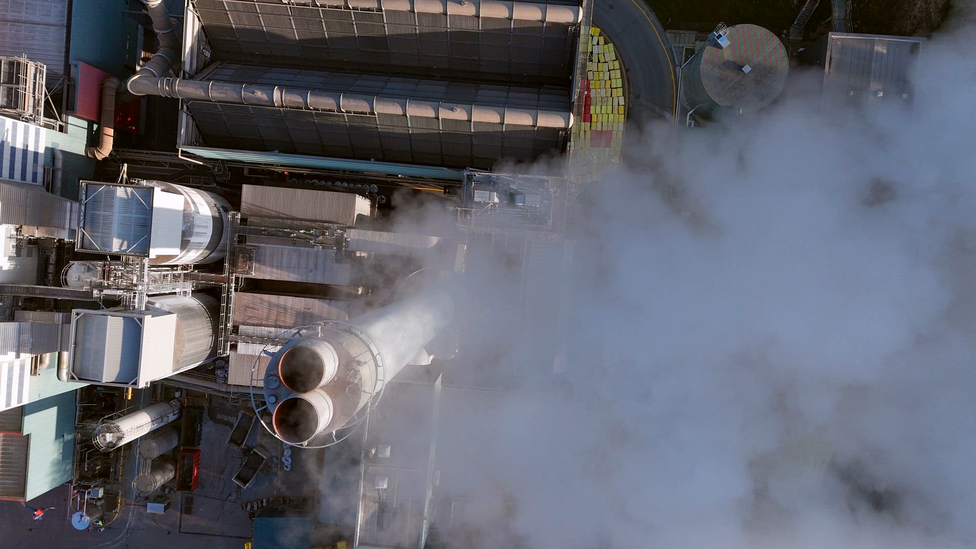 Smoke Bellows From an Industrial Chimney Contributing To Climate Change