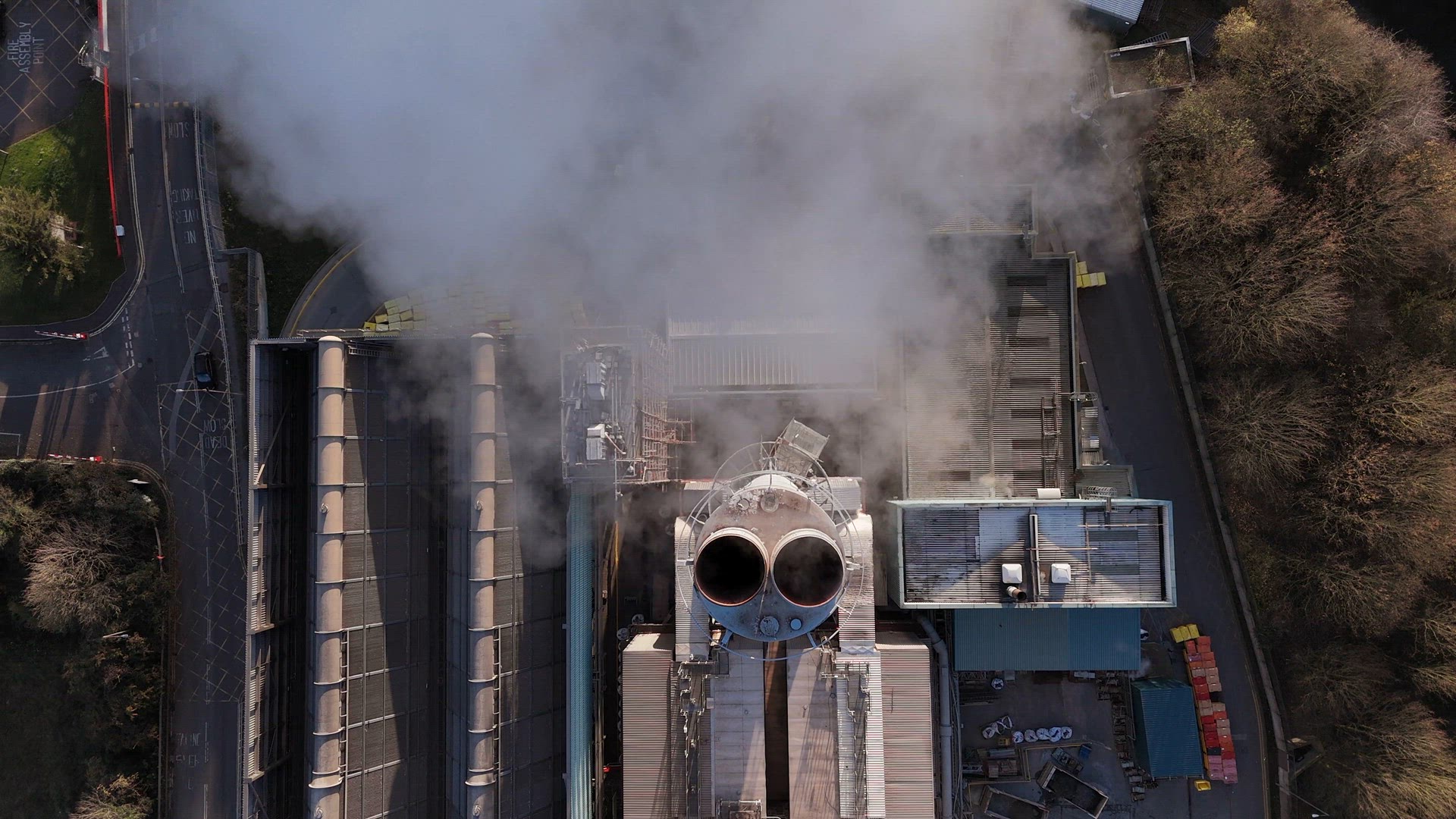 Smoke Bellows From an Industrial Chimney Contributing To Climate Change