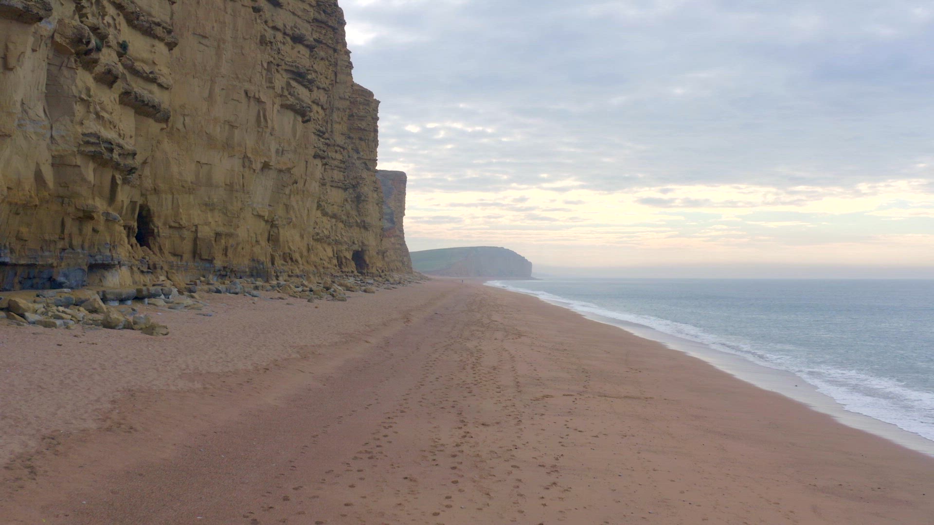 West Bay Sandstone Cliffs Overlooking the Sea in England