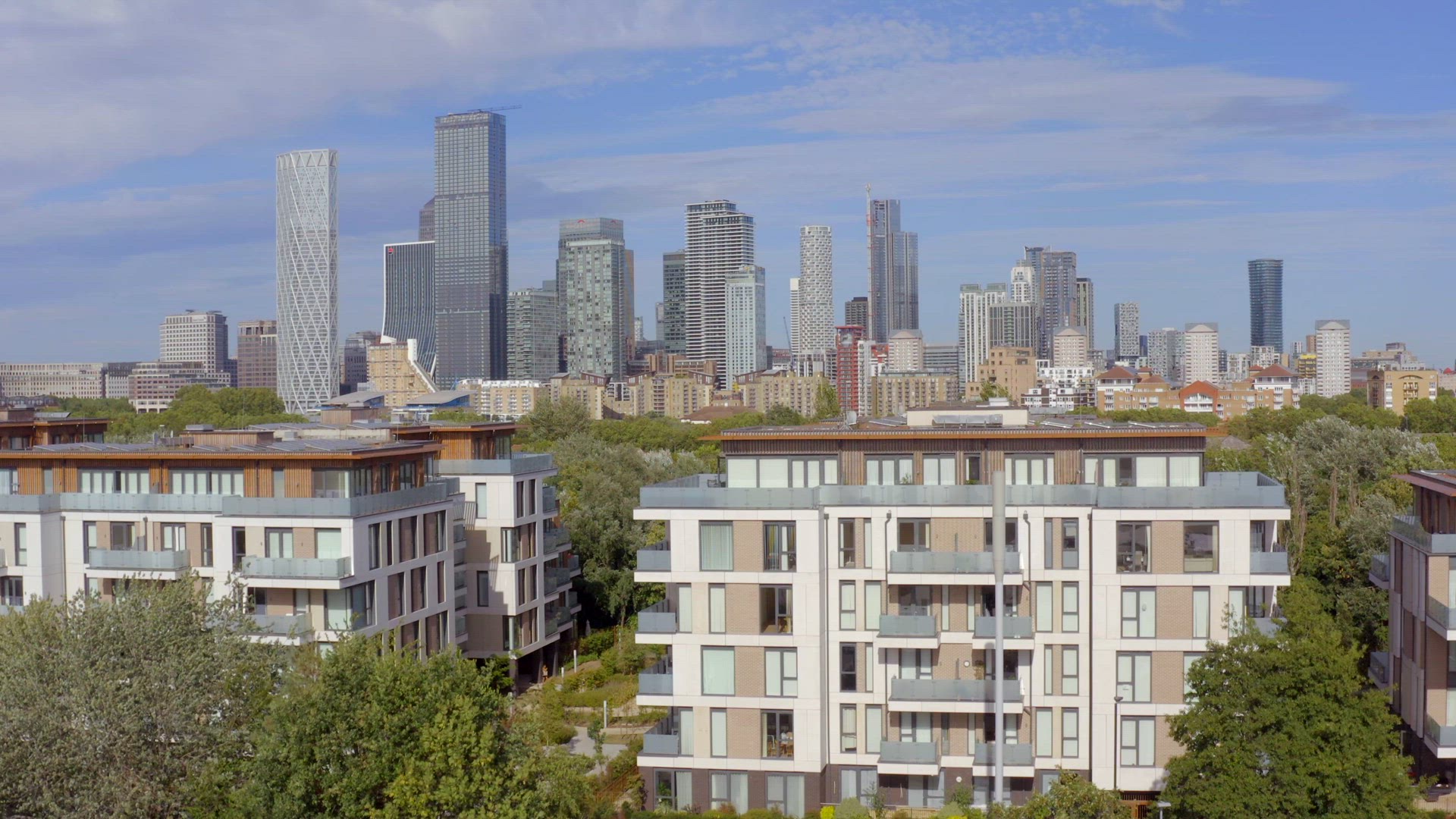 City of London and Suburban Housing Rising Aerial View
