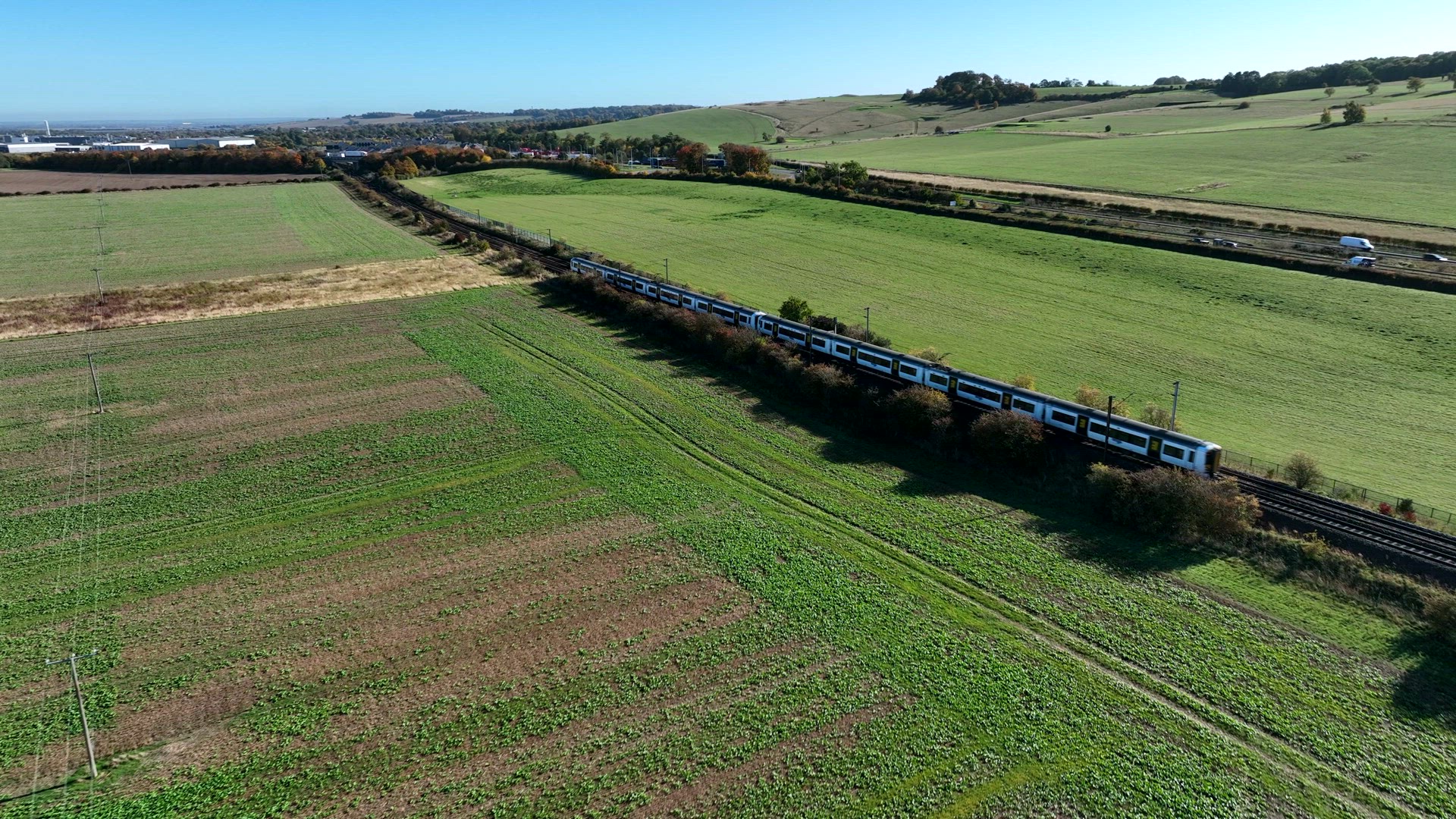 Commuter Train Speeding Through the Countryside in the UK