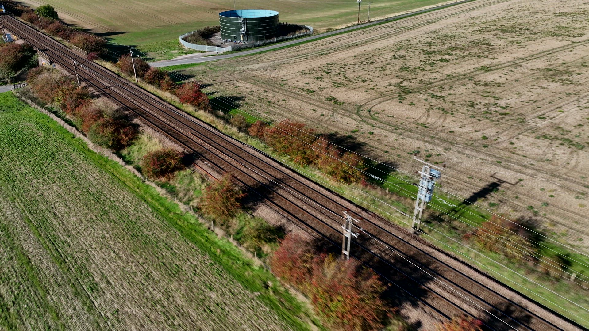 Commuter Train Speeding Through the Countryside in the UK