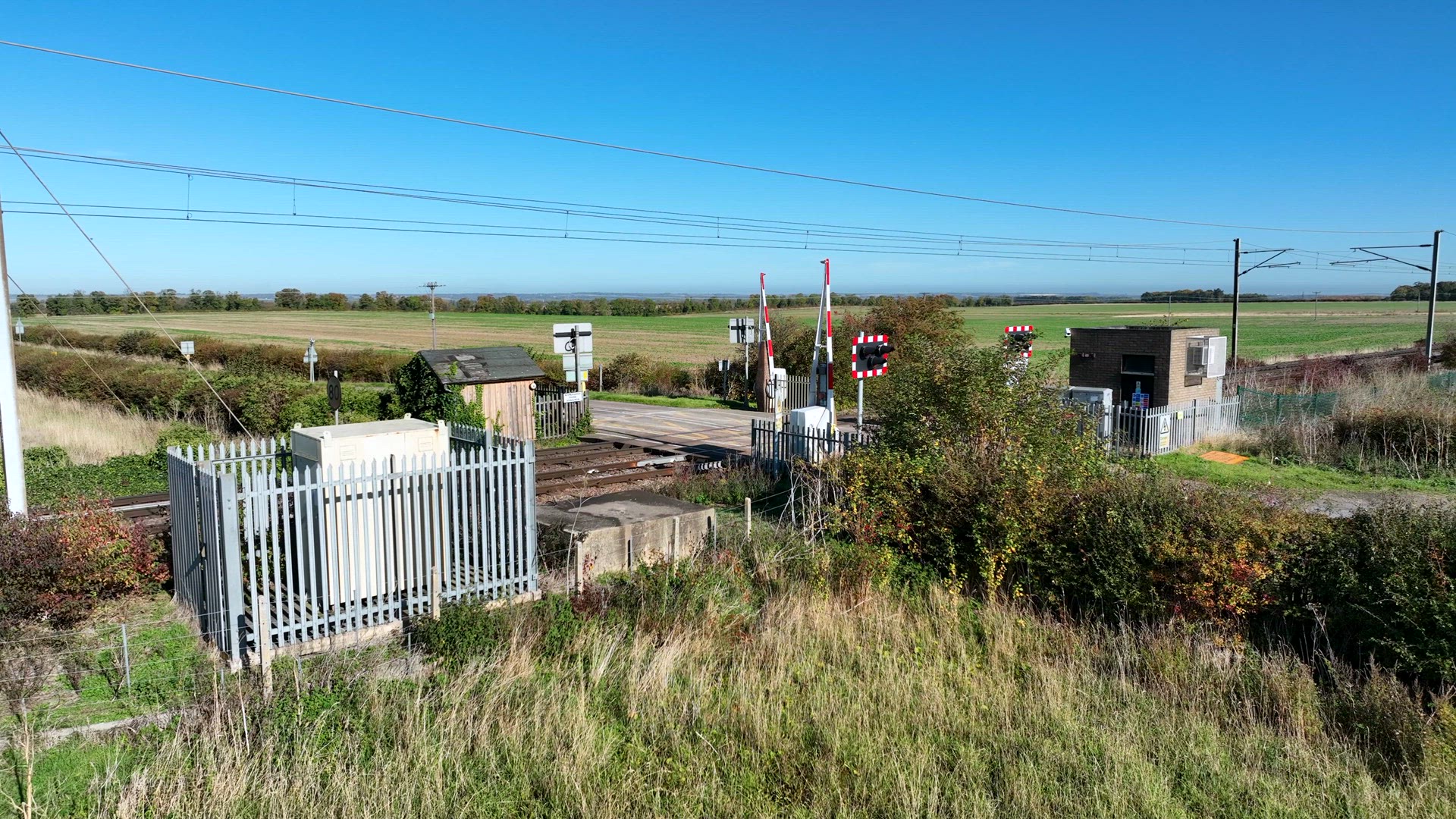 Level Crossing Barriers Closing to Indicate that a Train Will Be Passing Through
