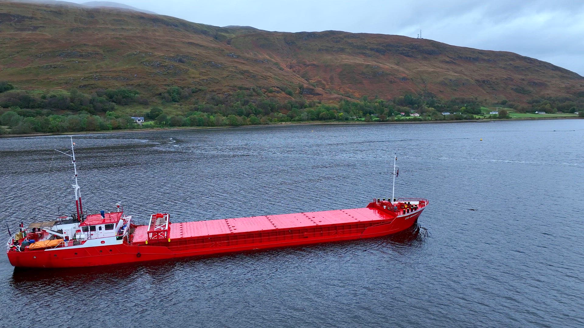A Cargo Barge Moves Construction Equipment Aerial View