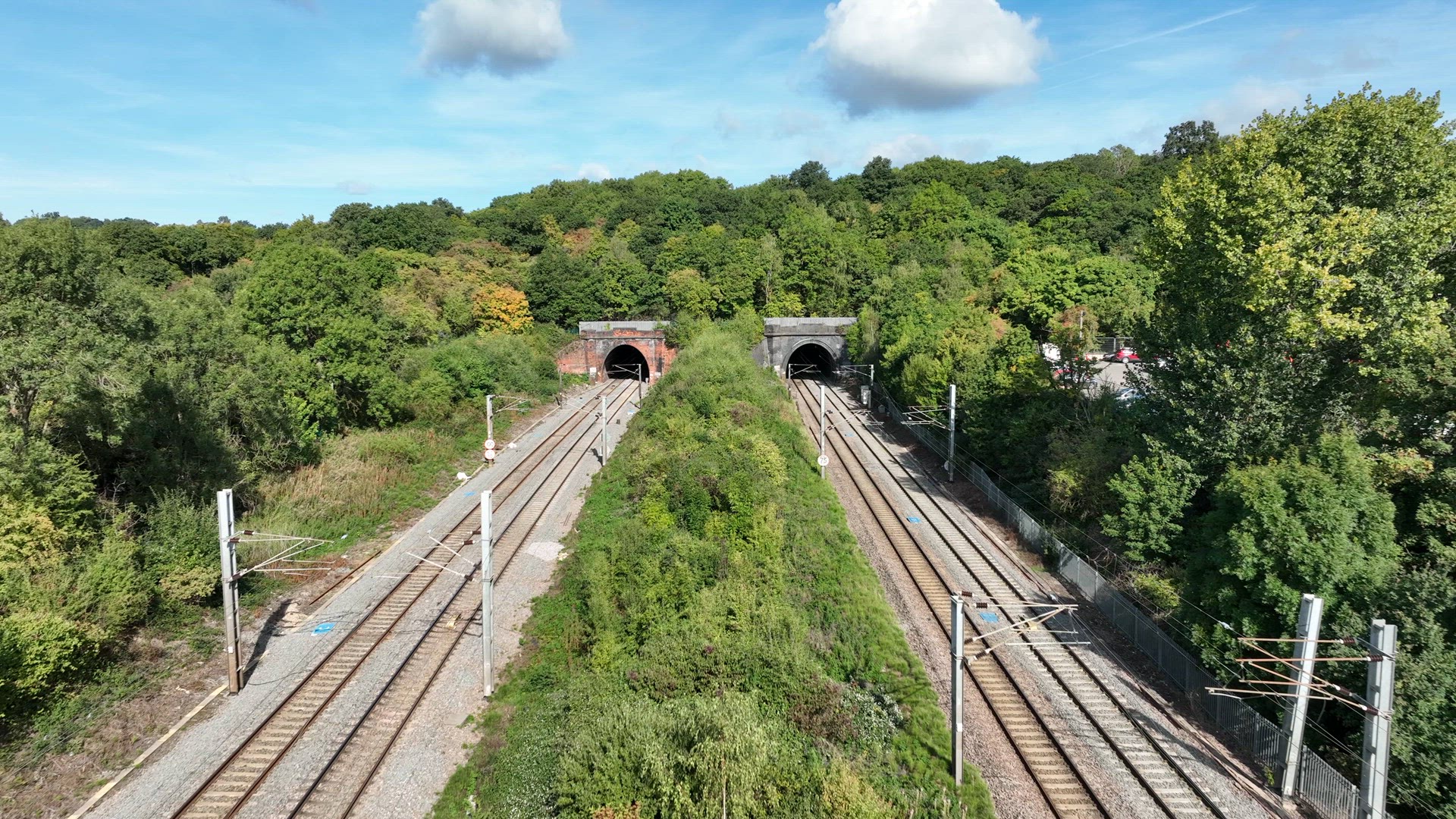 Fast Commuter Train Entering a Tunnel