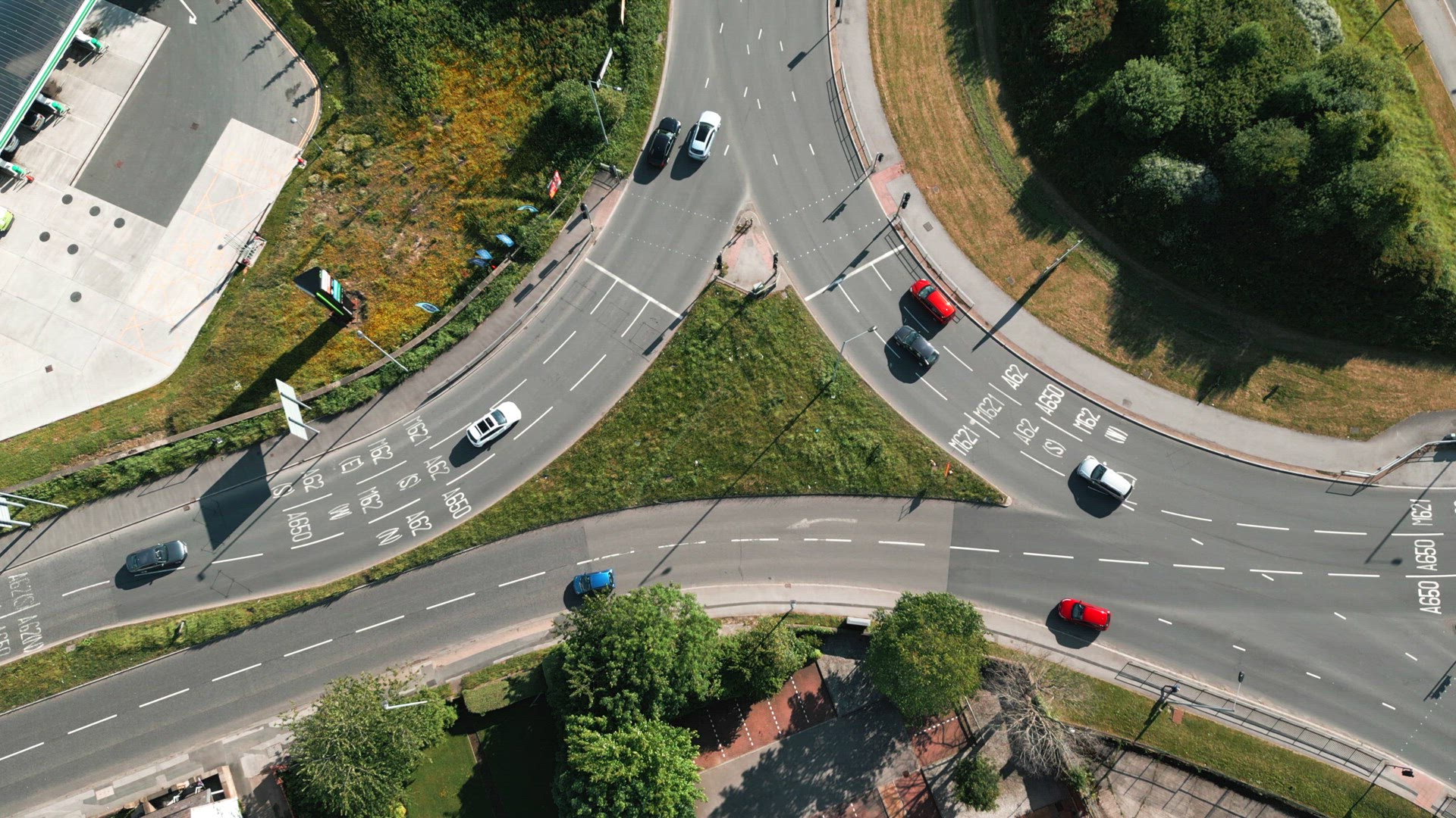 Vehicles Stopping at a Traffic Light Controlled Roundabout System
