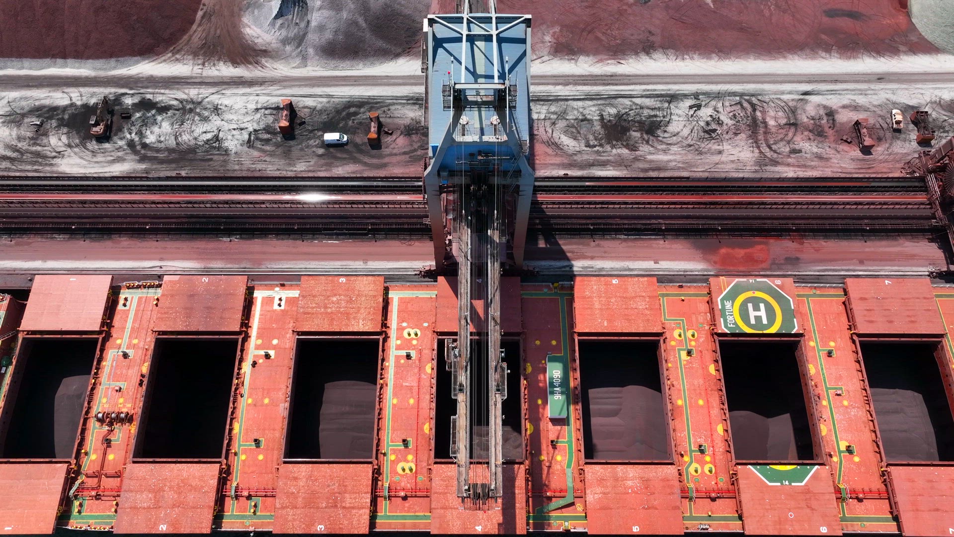 Bulk Carrier Ship Offloading Cargo By Crane for Processing