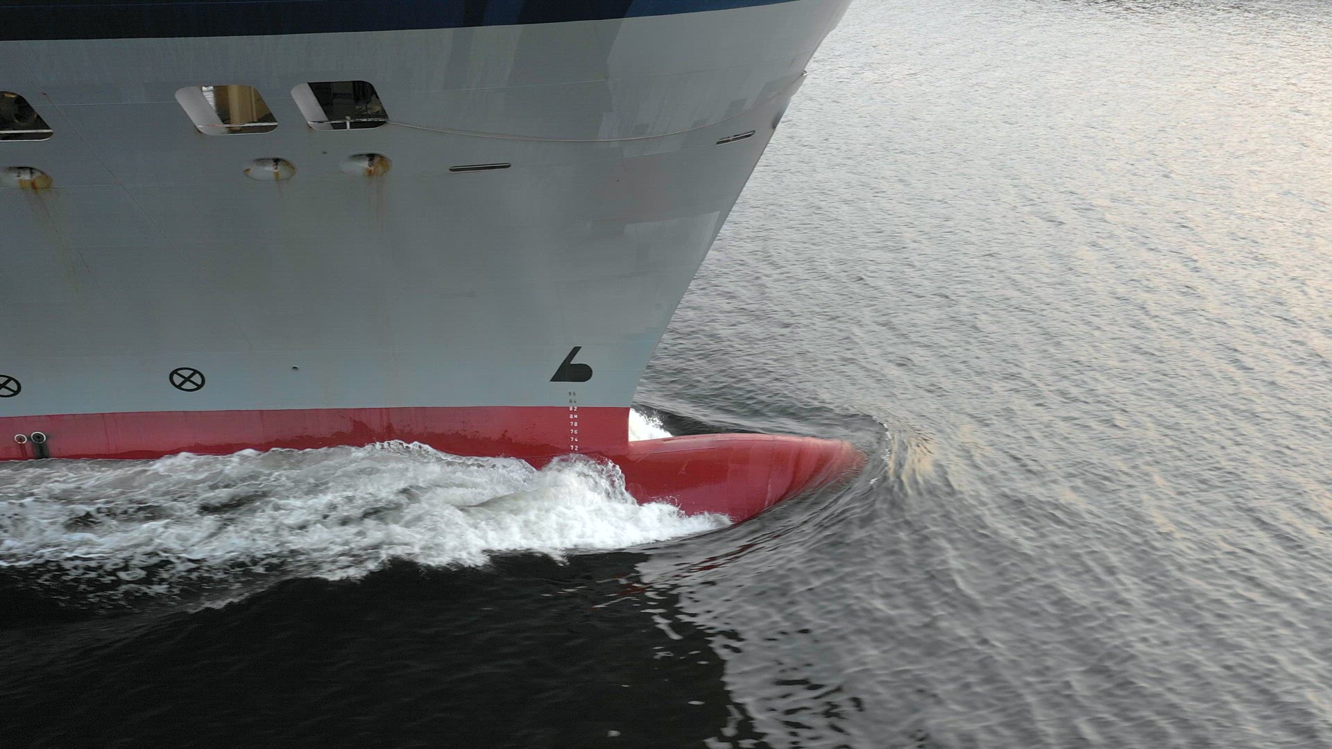 Ship's Bulbous Bow Cruising Through the Port