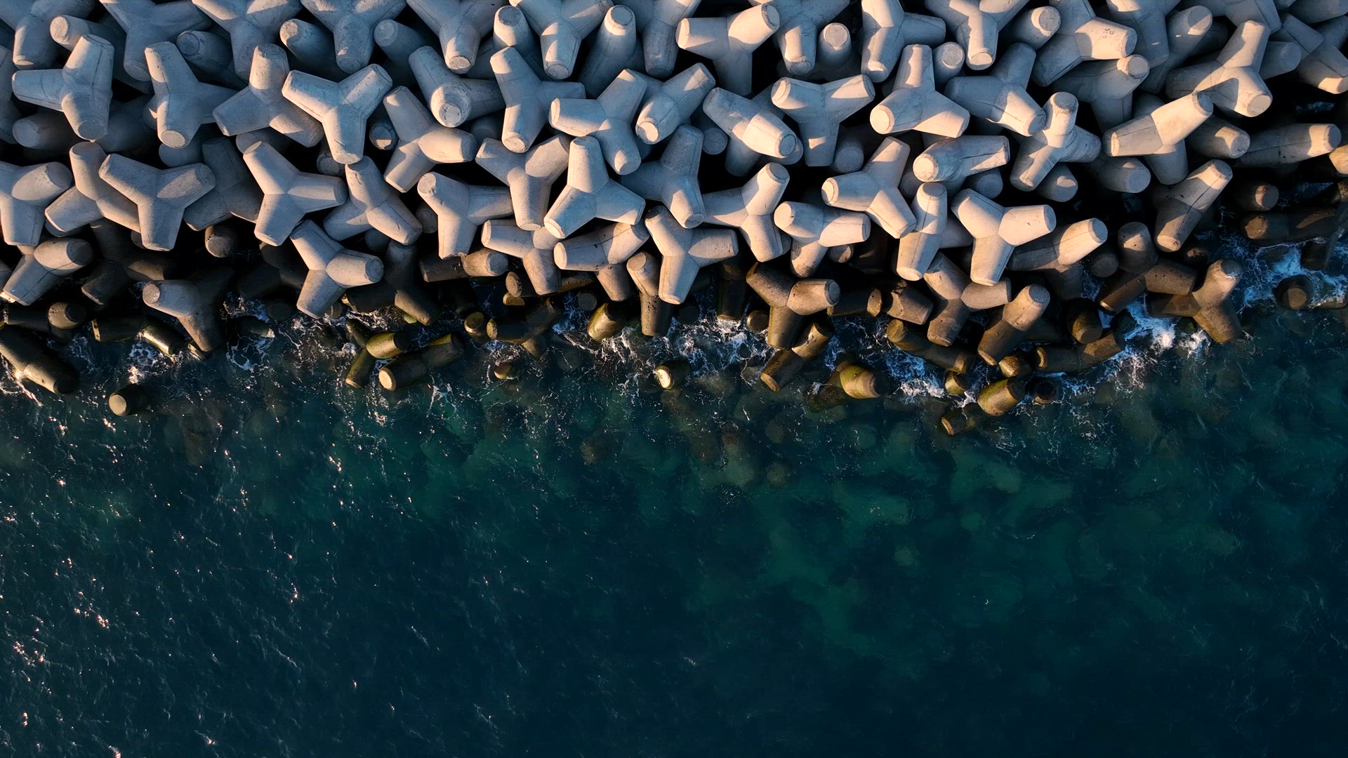 Tetrapod Concrete Breakwater Protecting the Coast from Erosion