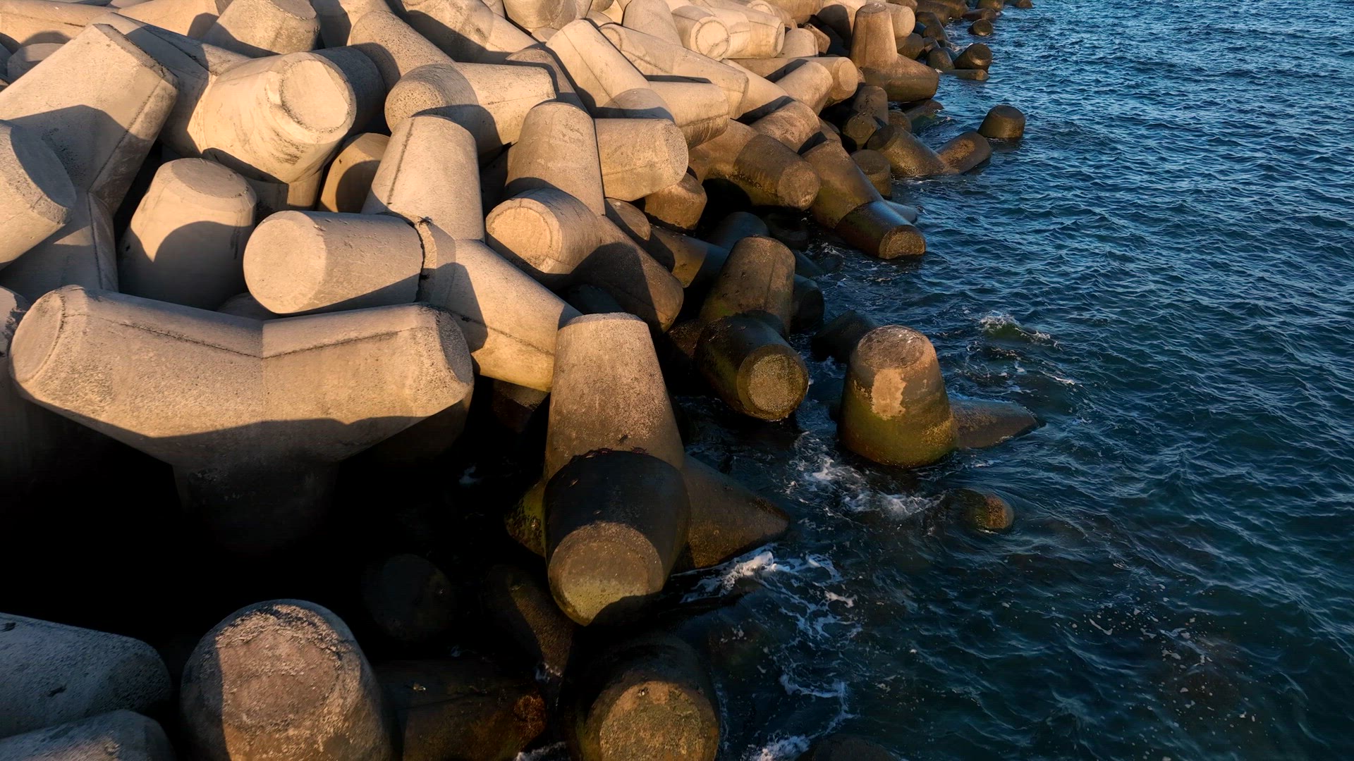 Tetrapod Concrete Breakwater Protecting the Coast from Erosion