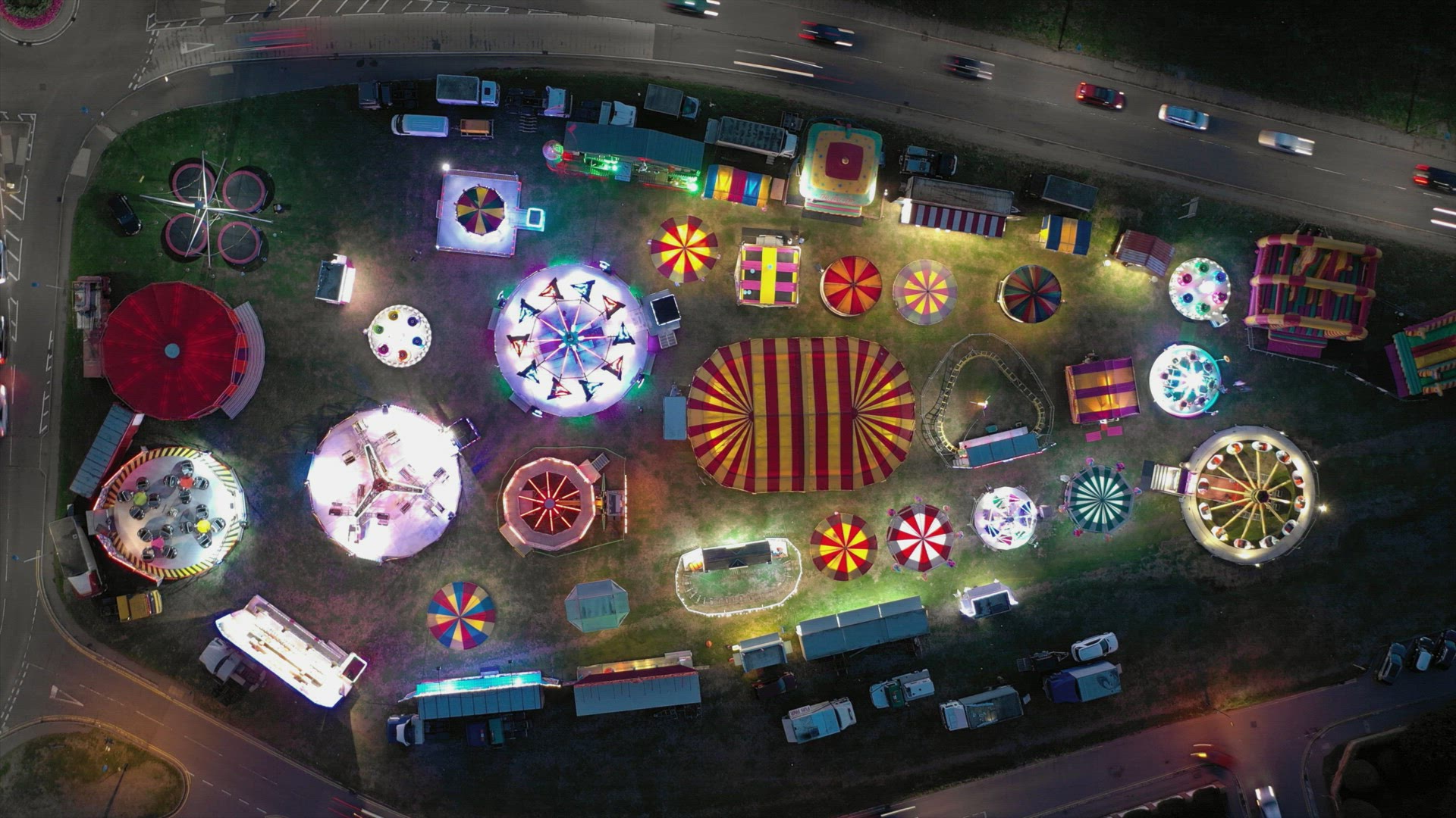 Bird's Eye Hyperlapse of a Travelling Fairground in a Town