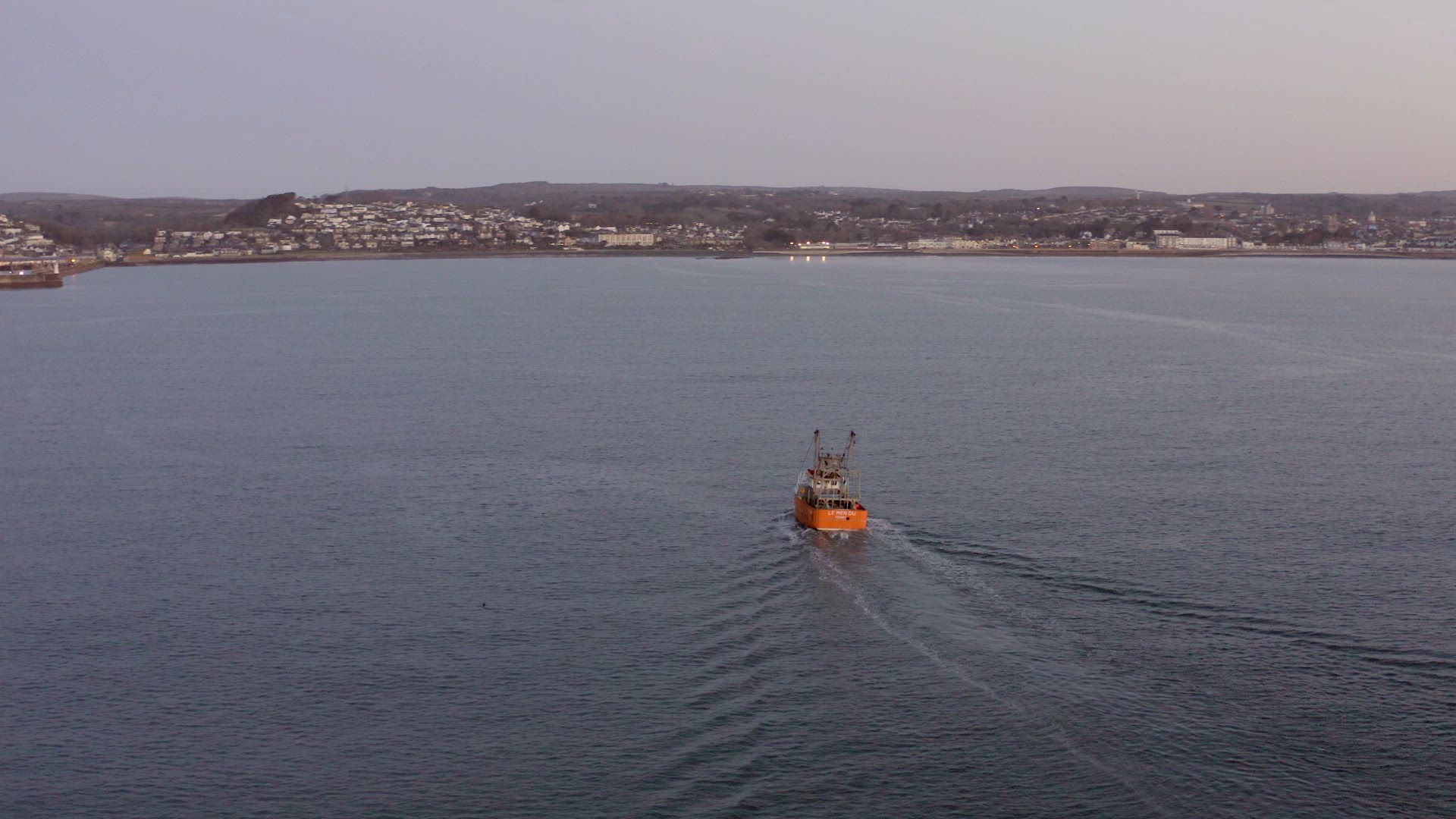 Fishing Boat at Sunrise out at Sea