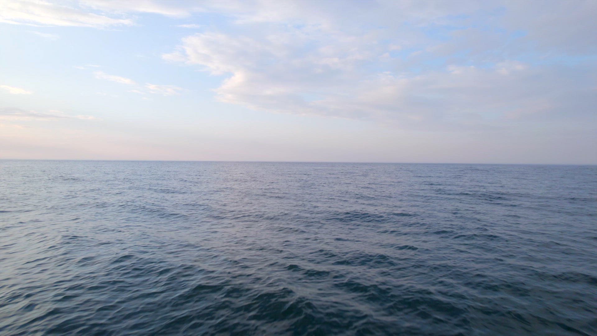 Low Flight Over The Ocean at Sunrise