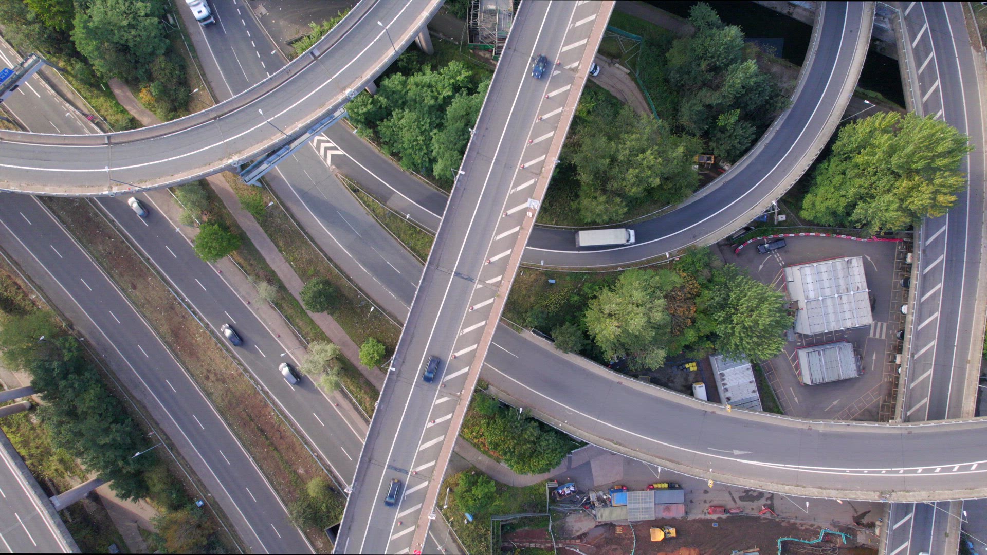 Vehicles Driving on a Mixing Interchange Bird's Eye Aerial View