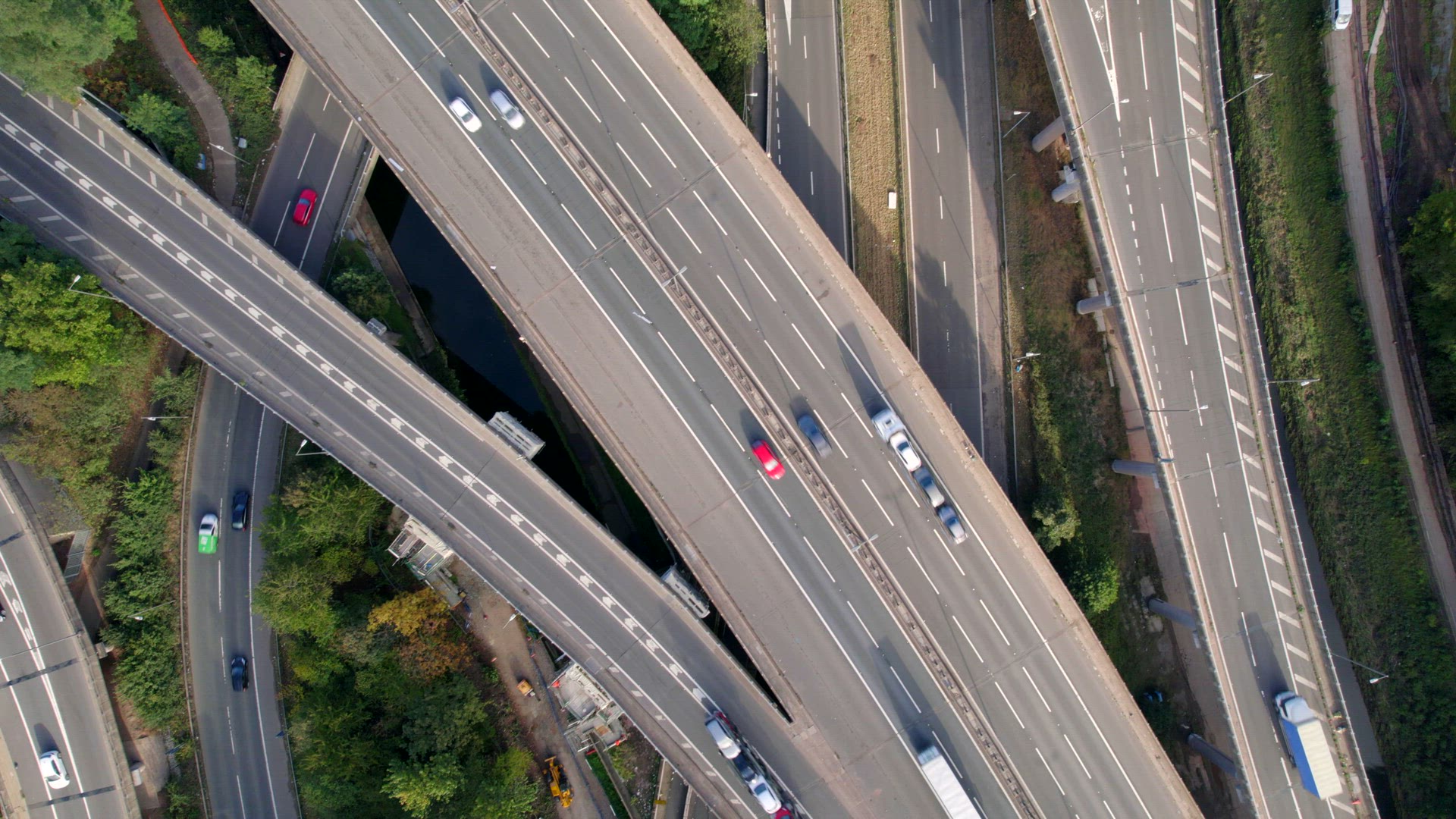 Vehicles Driving Through a Mixing Bowl Interchange Aerial View