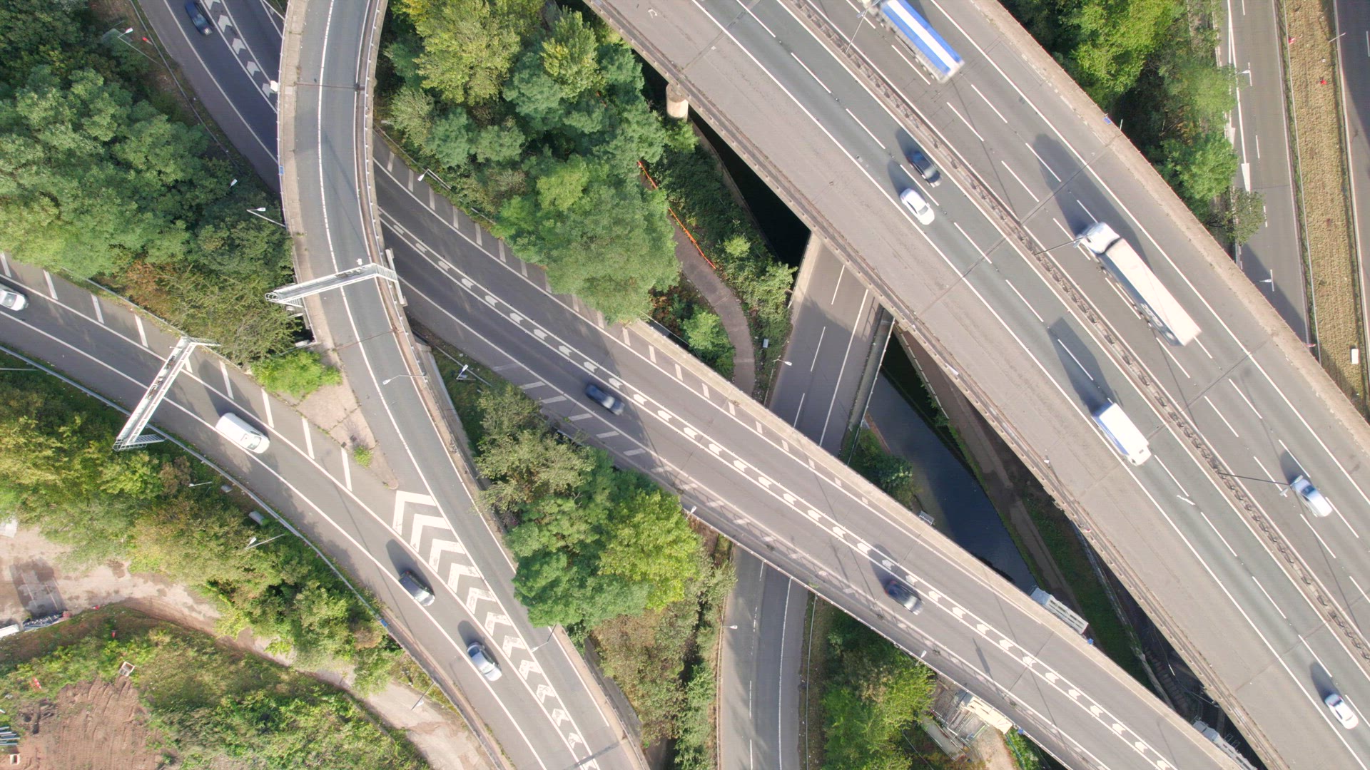 Time Lapse of Vehicles in a Mixing Bowl Interchange Bird's Eye View