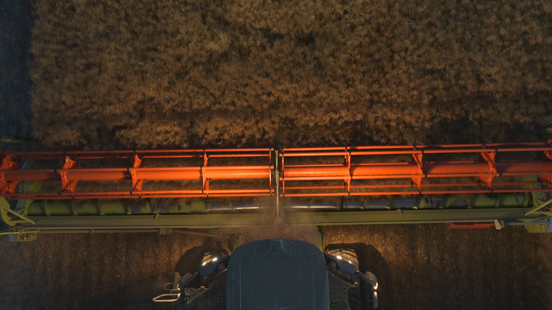 Combine Harvester at Night During the Harvest