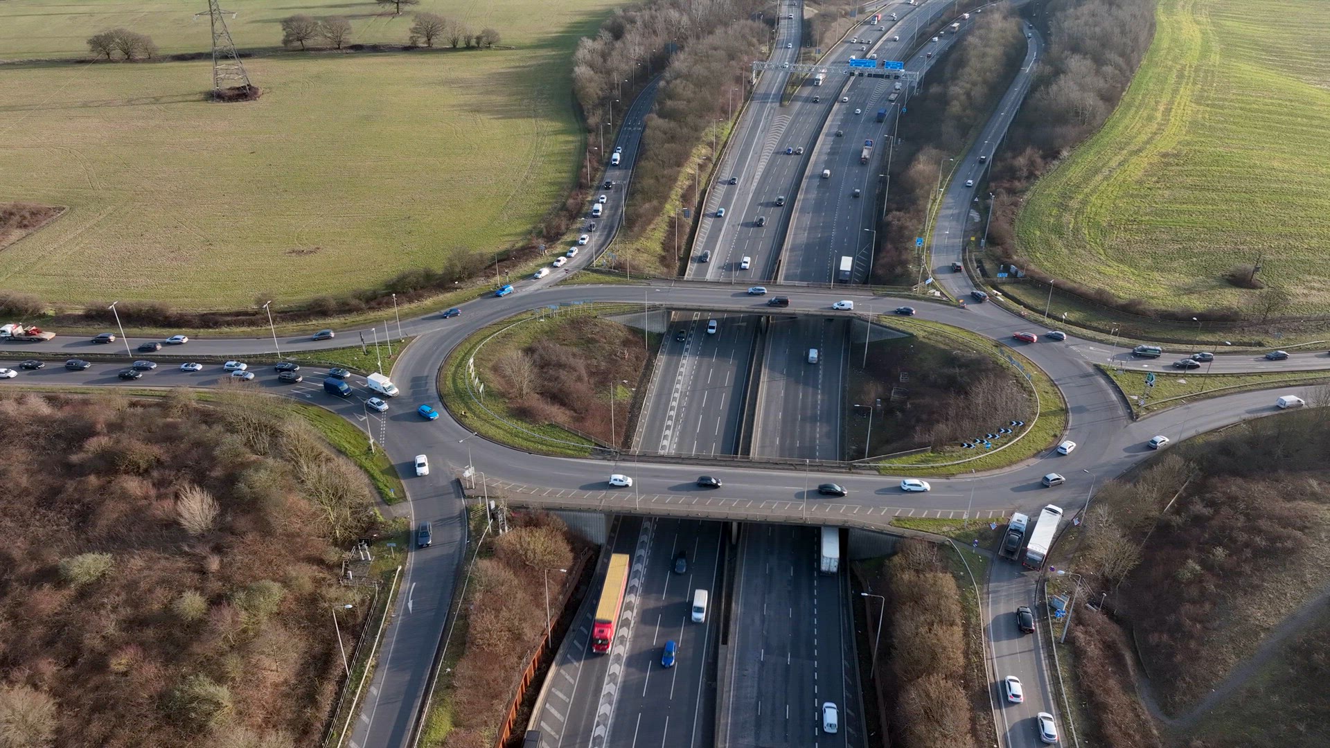 Freeway Roundabout Junction at Rush Hour Aerial View