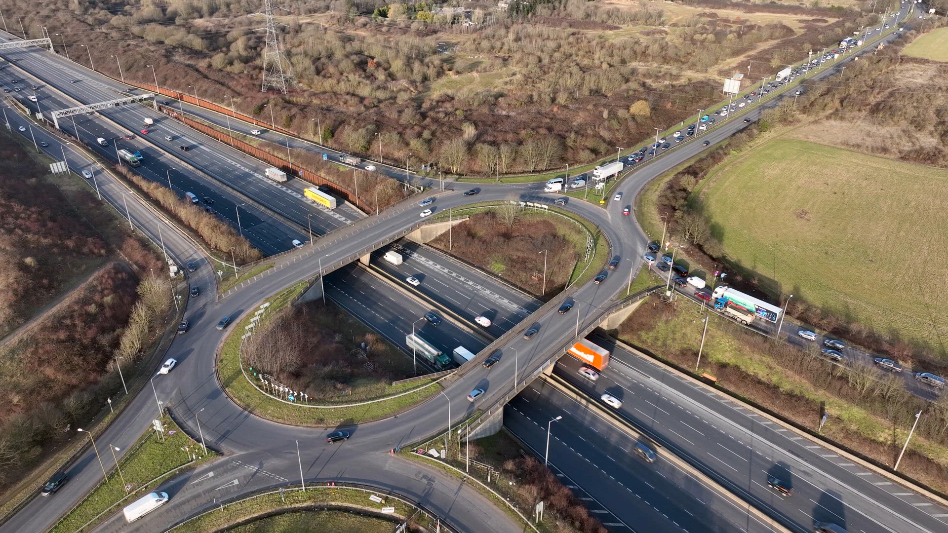Freeway Roundabout Junction at Rush Hour Aerial View