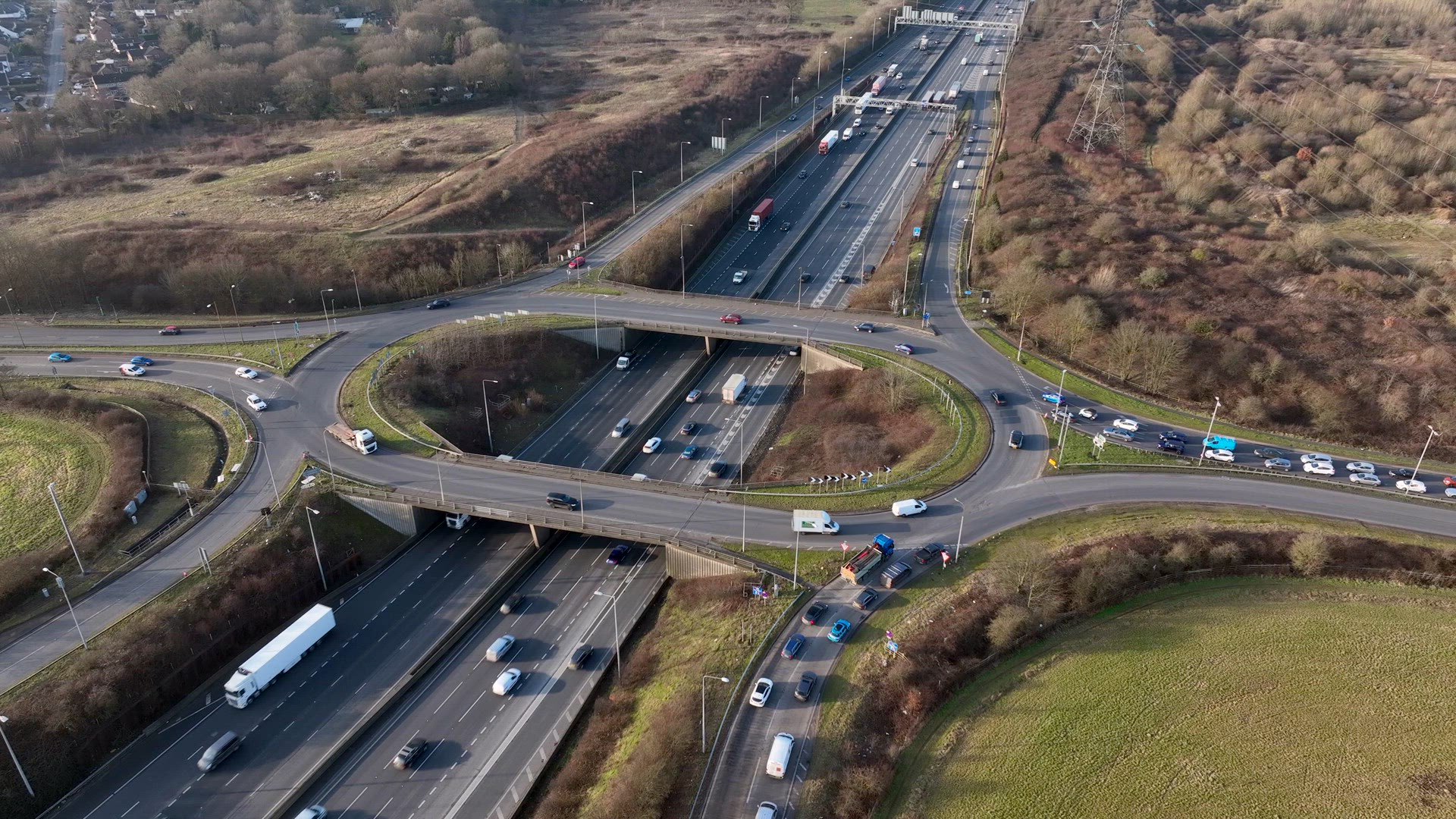 Freeway Roundabout Junction at Rush Hour Aerial View