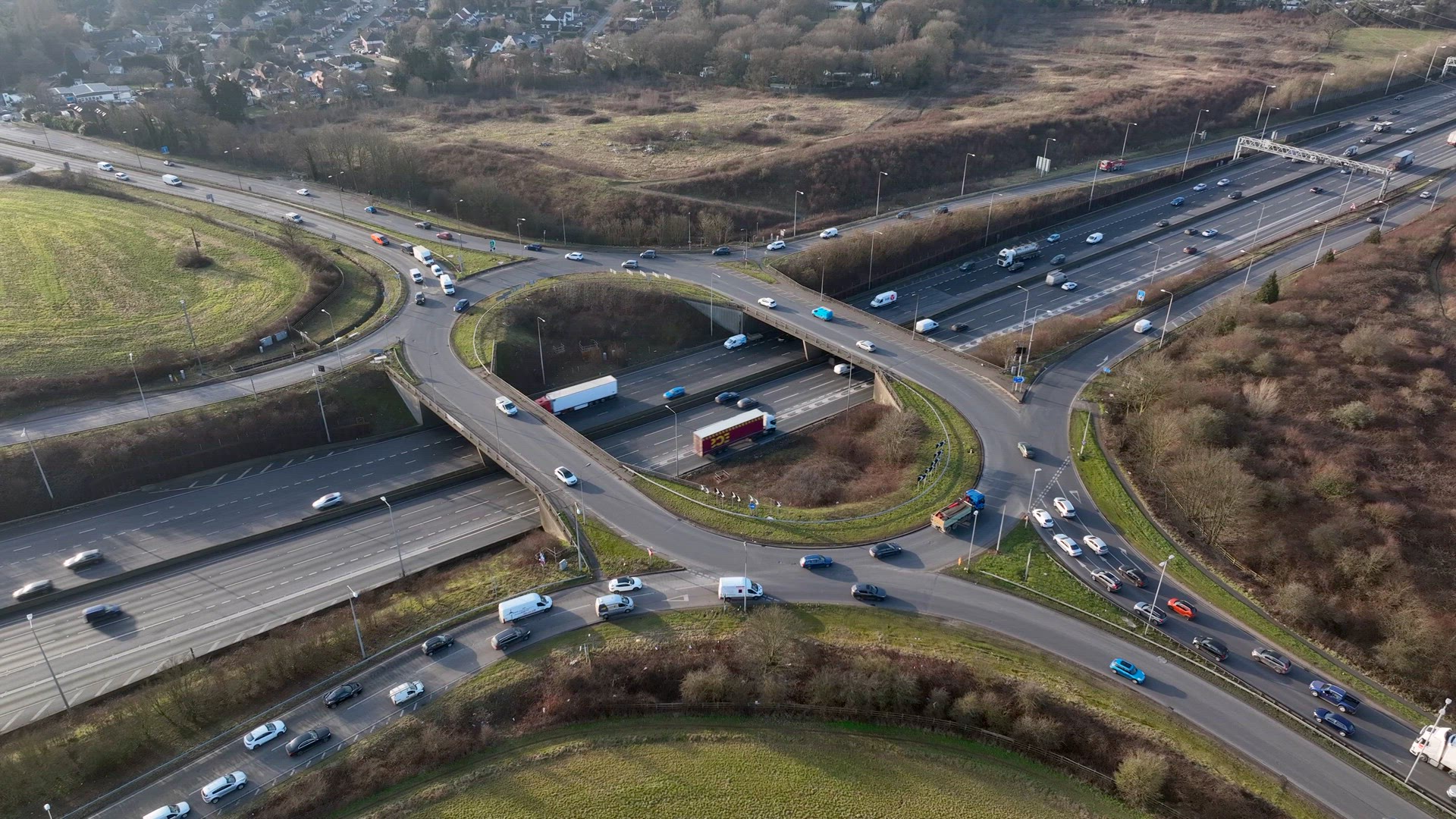 Freeway Roundabout Junction at Rush Hour Aerial View