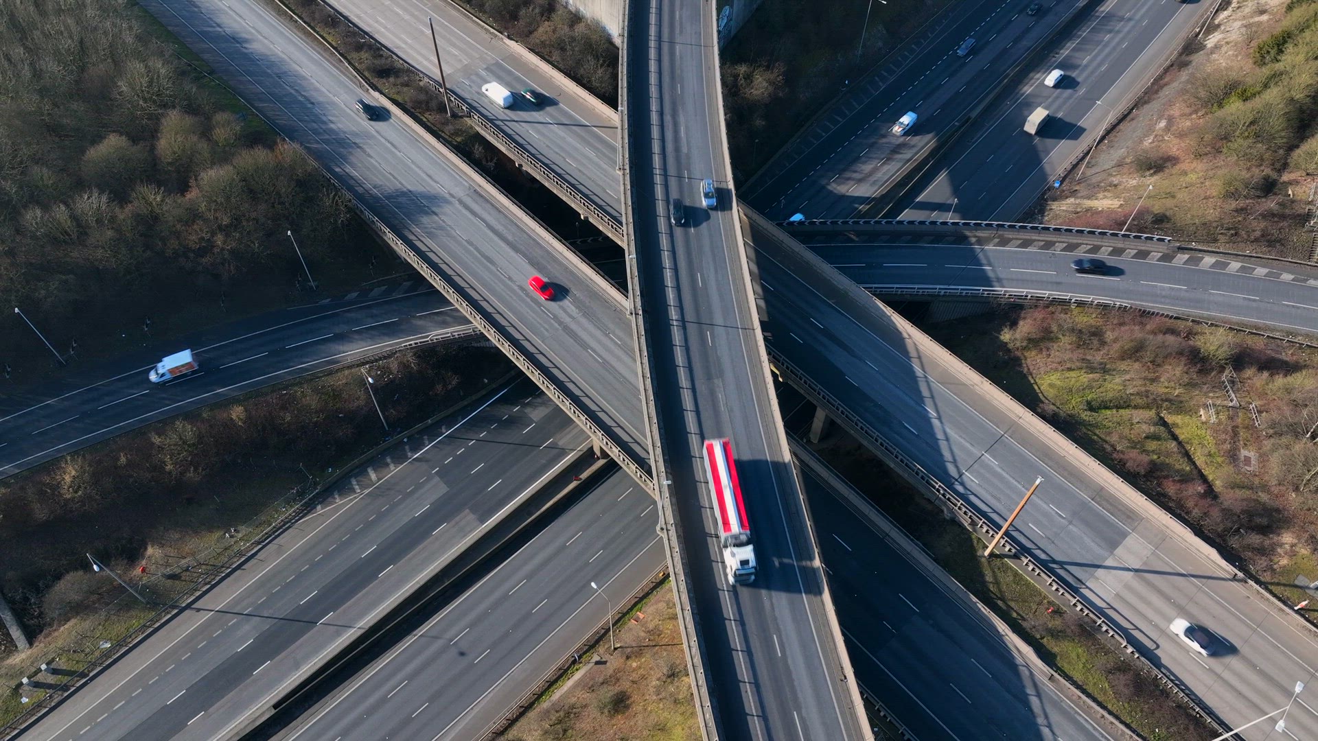 Rush Hour Vehicles Driving on a Highway Interchange Junction Aerial View