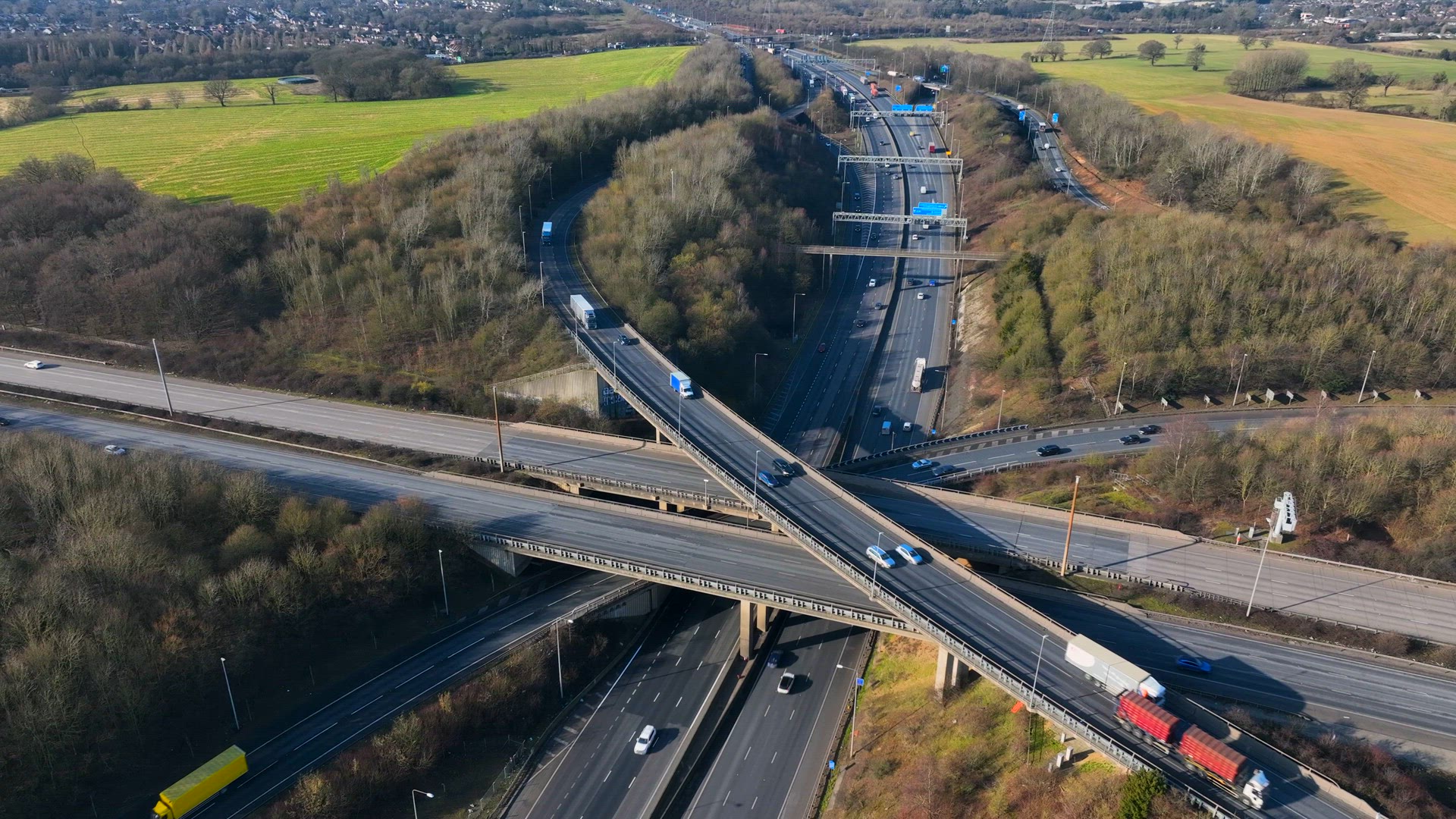 Aerial View of a Busy Highway Interchange With Vehicles Driving