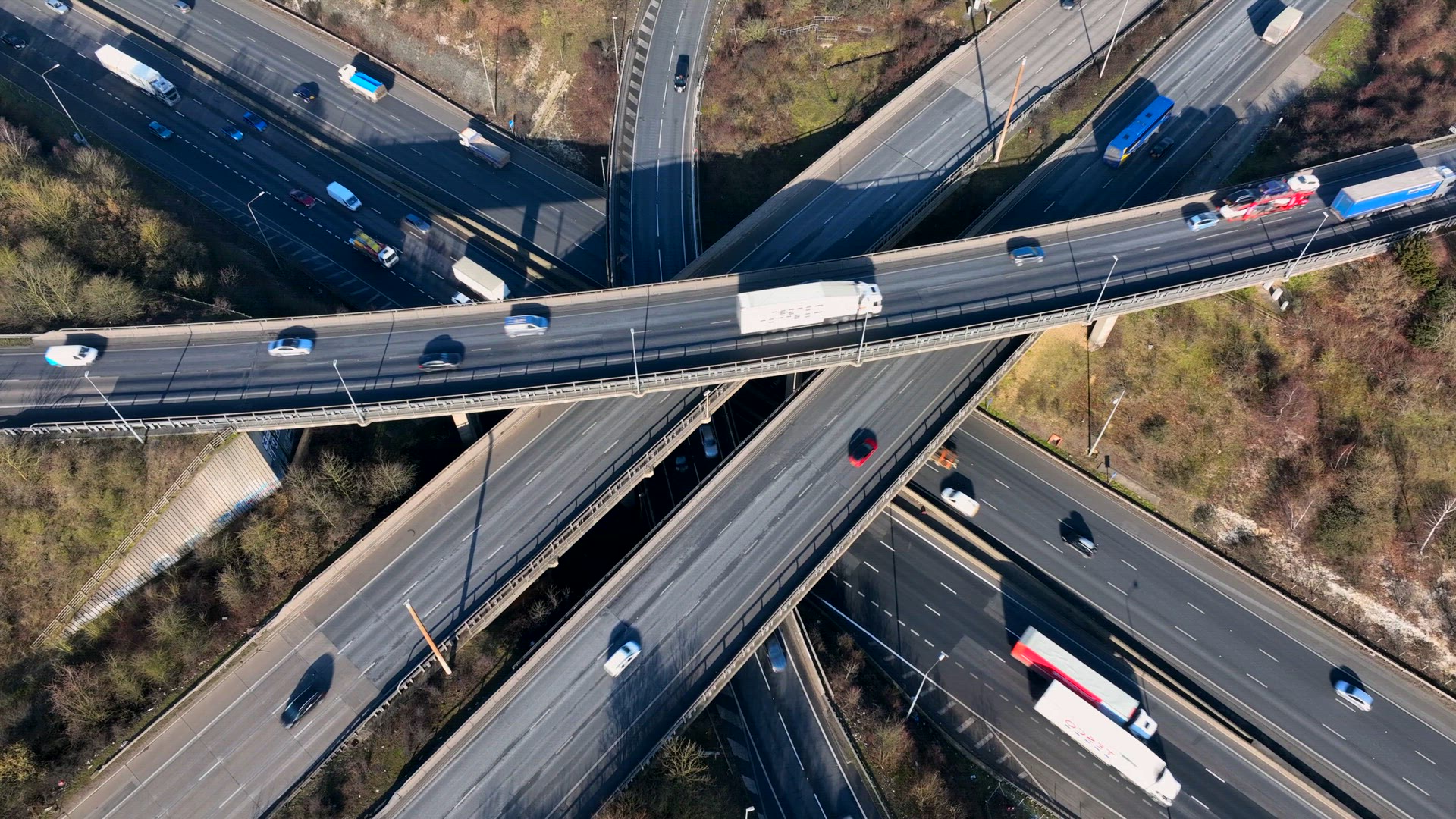 Time Lapse Vehicles Driving on a Highway Interchange Junction Aerial View