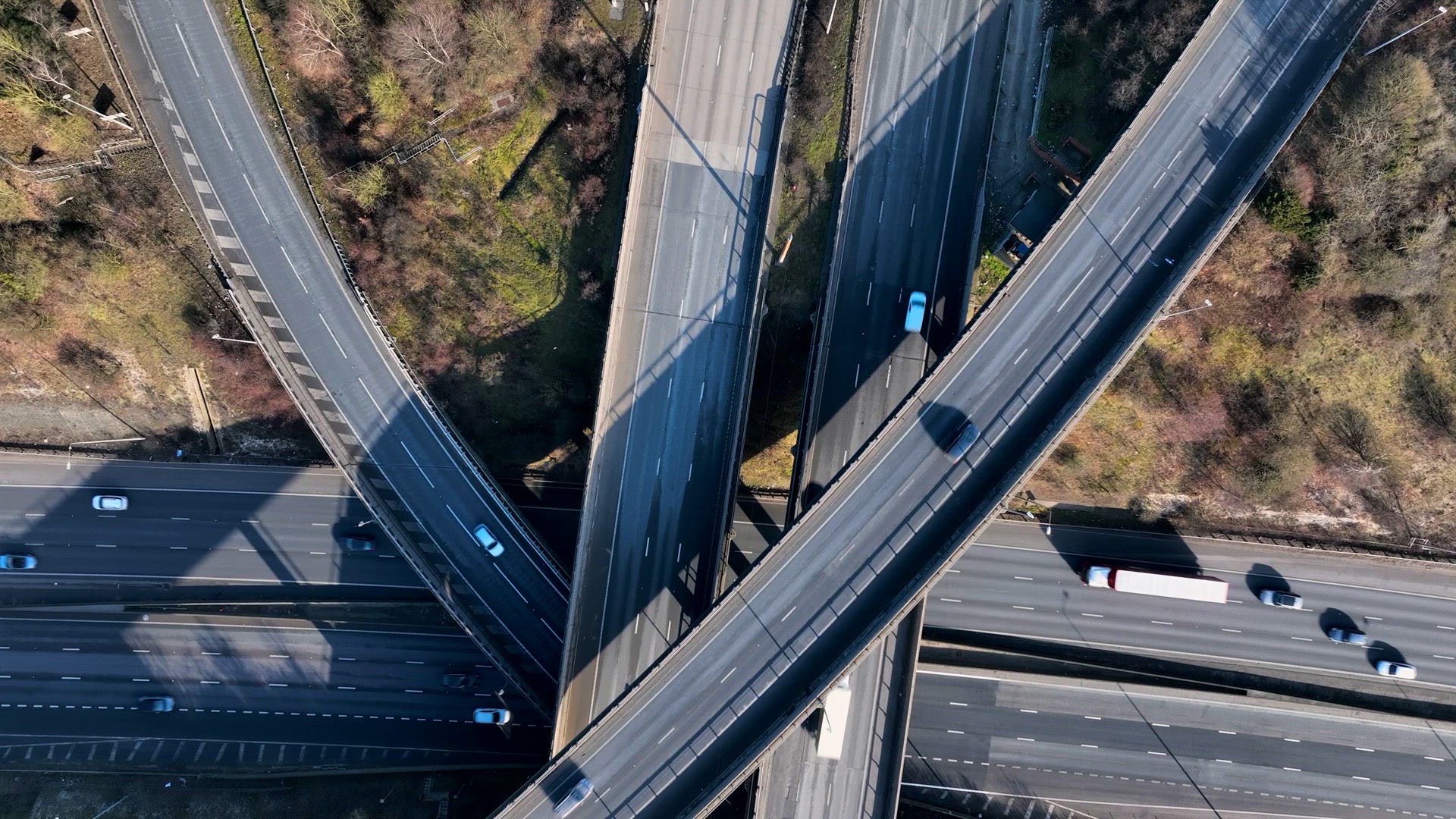 Rush Hour Vehicles Driving on a Highway Interchange Junction Aerial View
