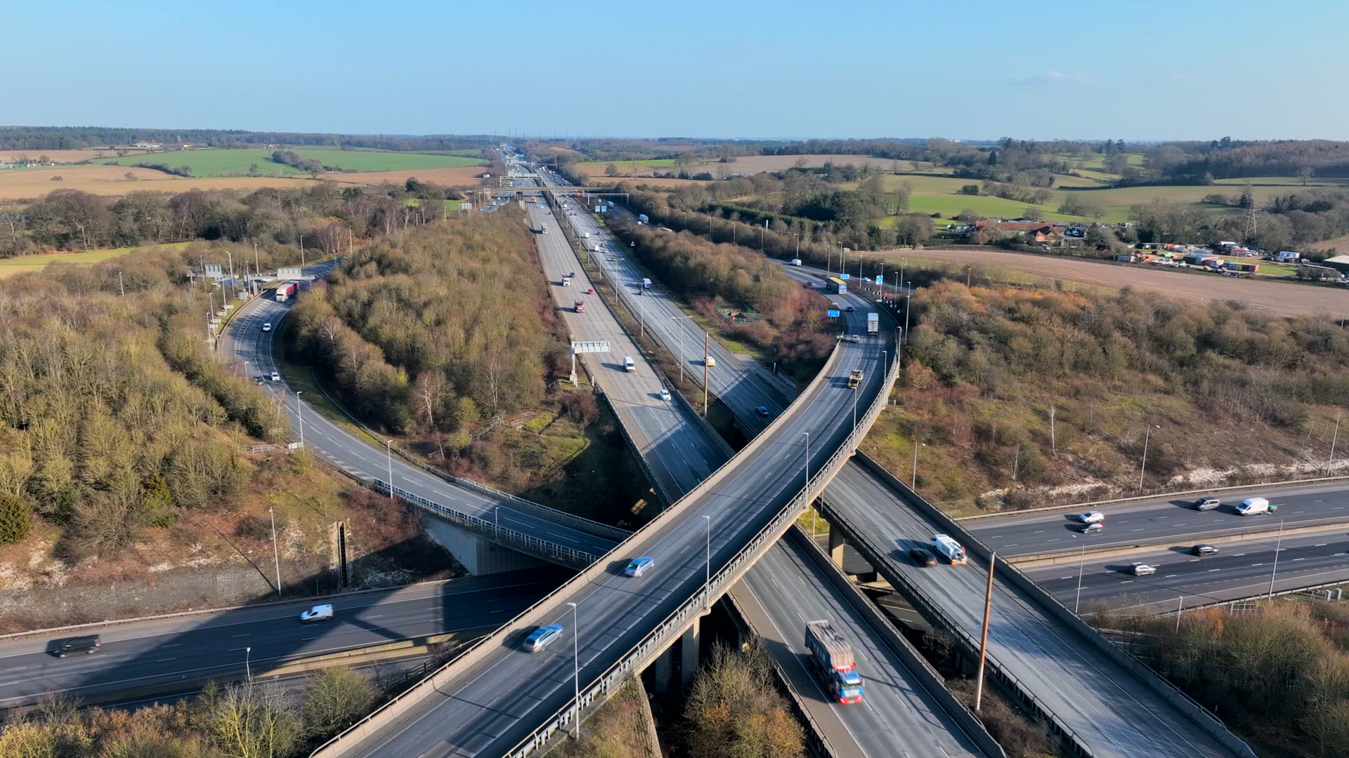 Rush Hour Vehicles Driving on a Highway Interchange Junction Aerial View