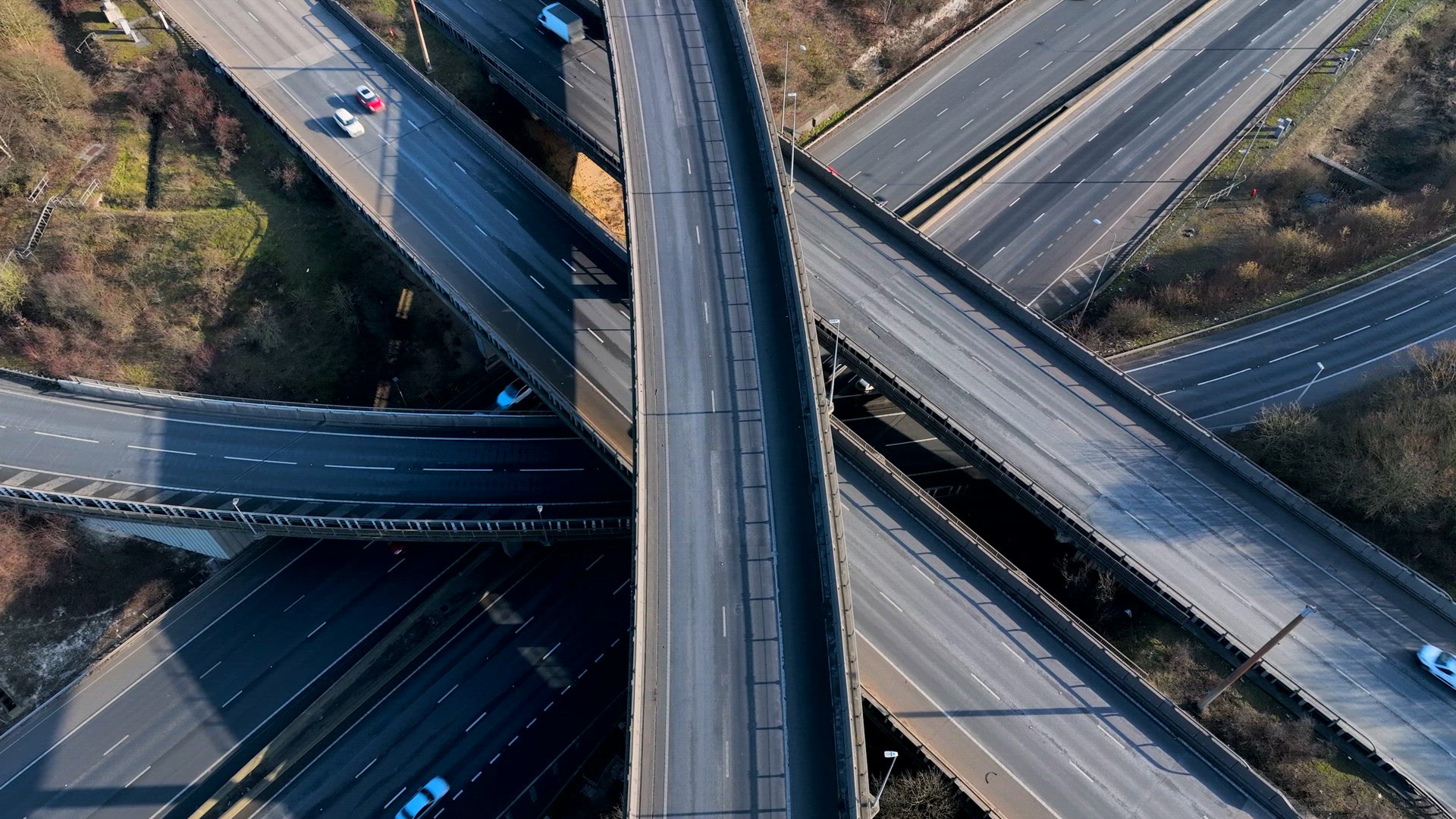 Rush Hour Vehicles Driving on a Highway Interchange Junction Aerial View
