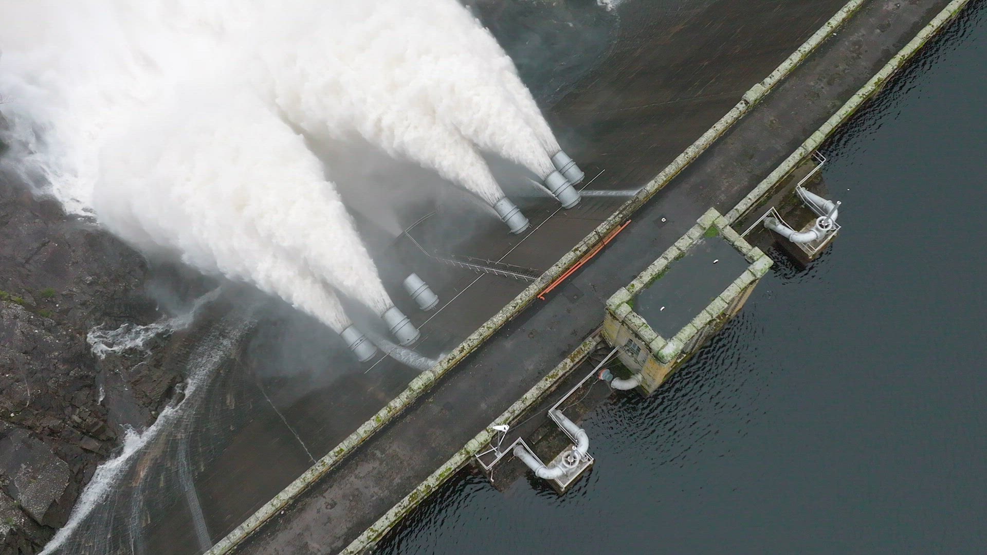 Water Being Pumped Through a Gravity Fed Hydroelectric Power Station Dam
