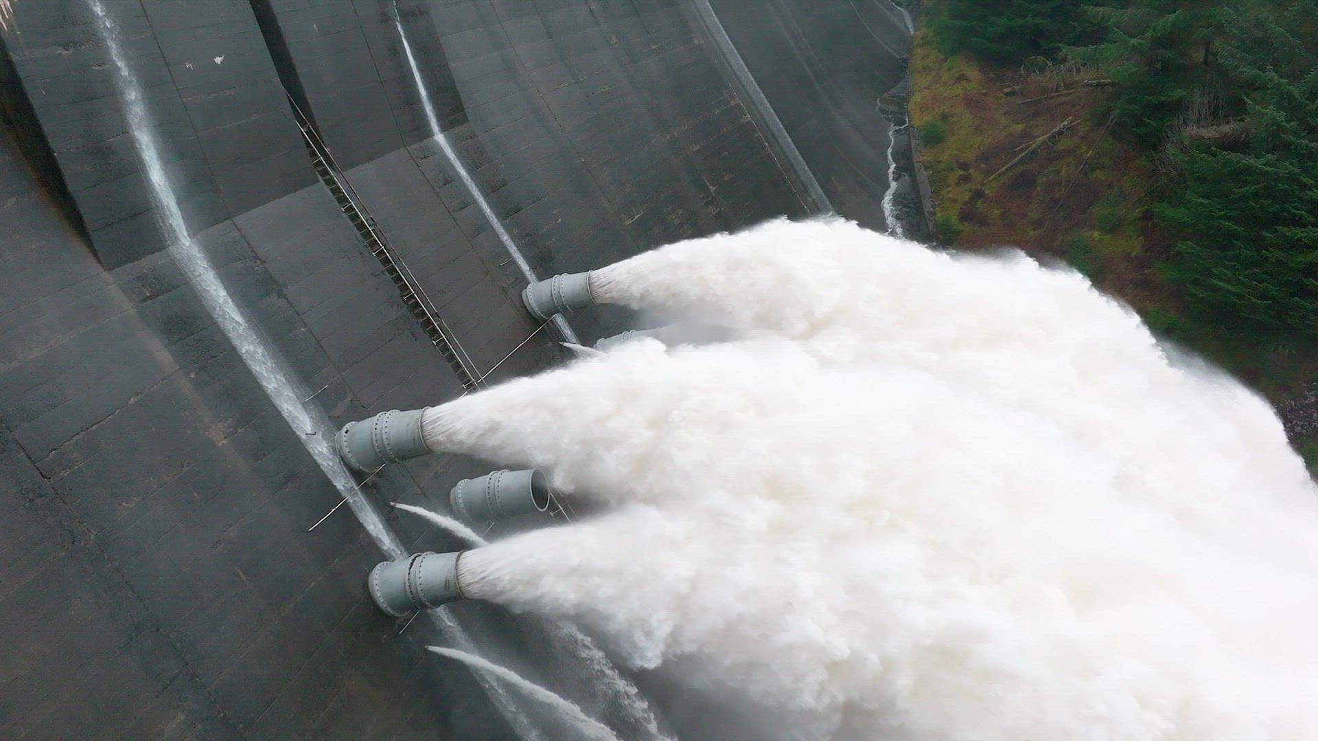 Water Pumped Through a Gravity Fed Hydroelectric Power Station Dam Slow Motion