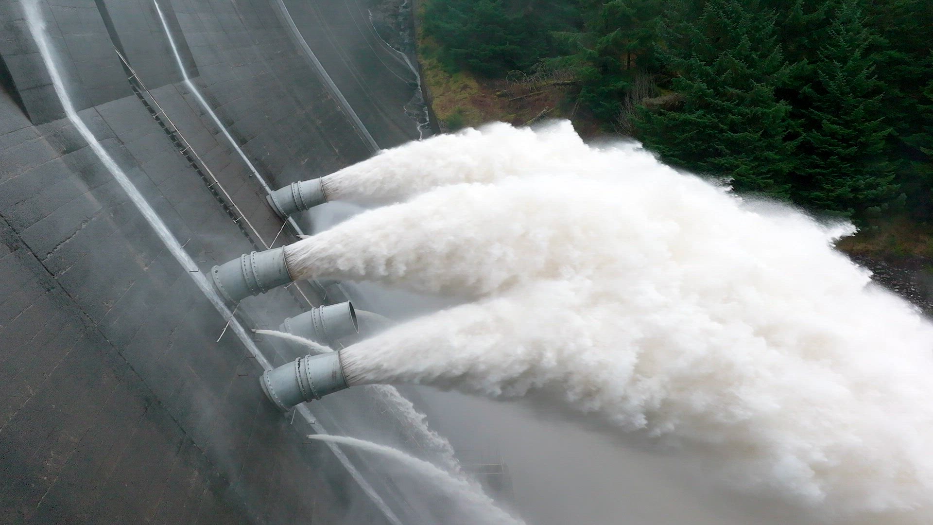 Hydroelectric Power Station Pumping Water Through a Dam Slow Motion