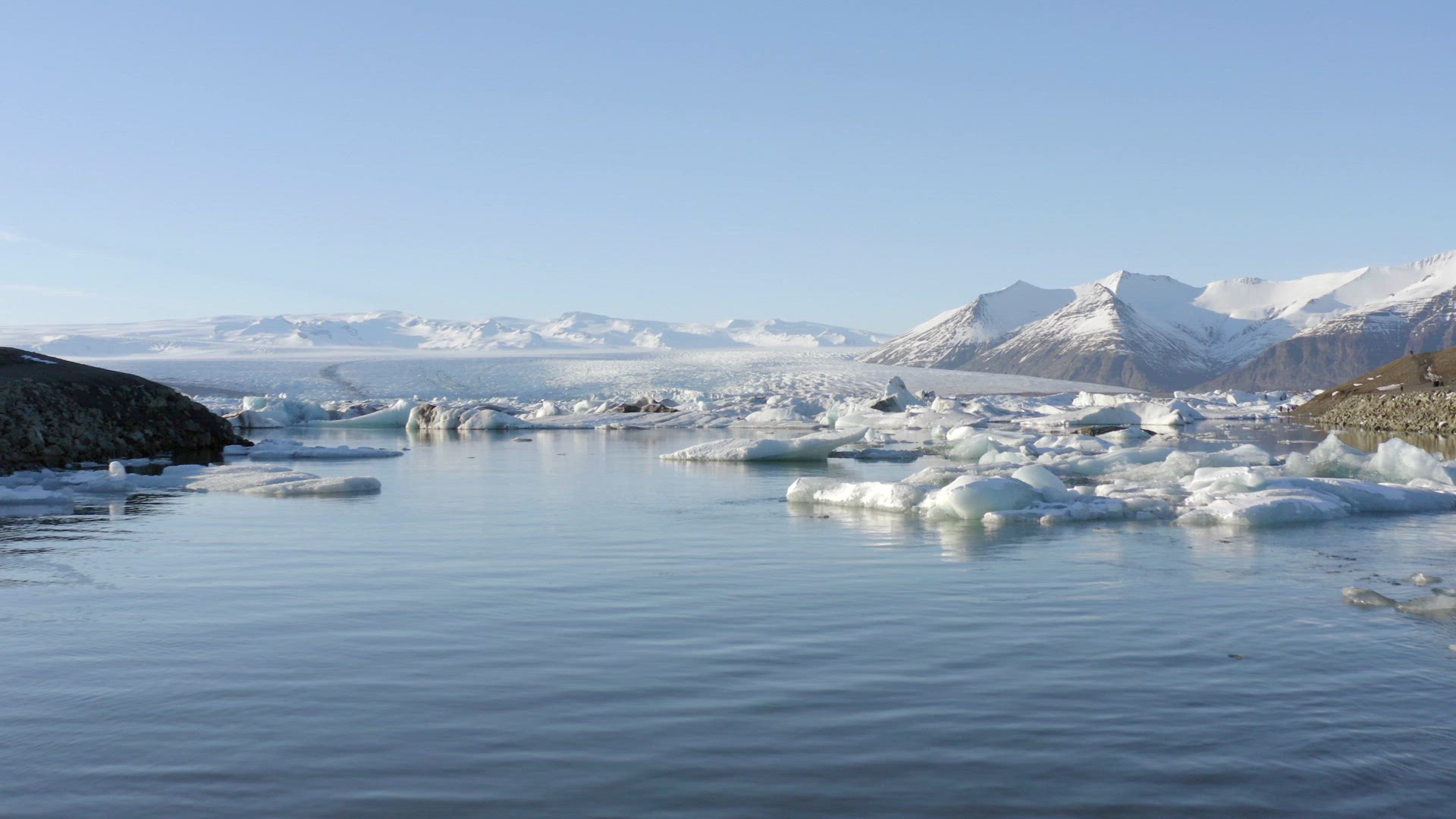 Glacier Lagoon in Iceland Filled With Icebergs Low Flight