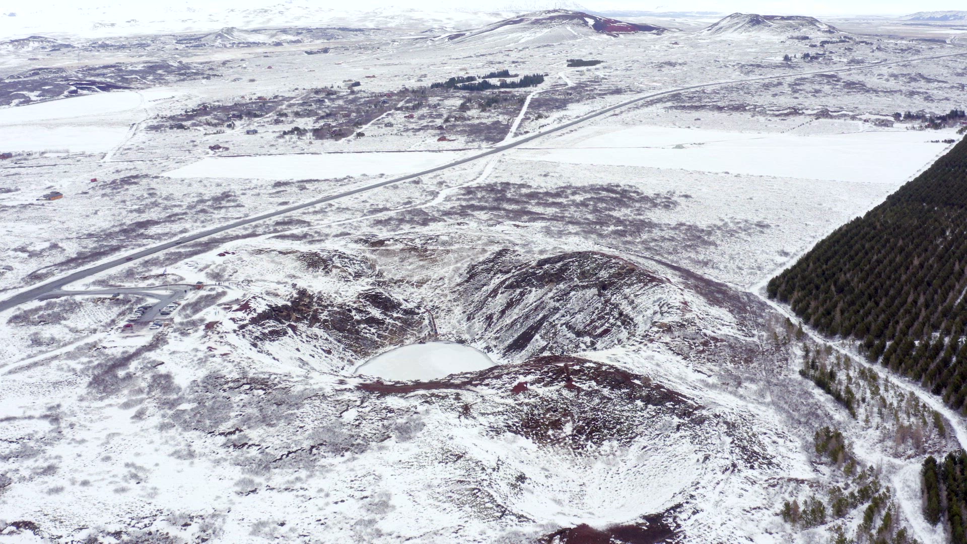 Snowy Volcanic Kerid Crater on the Golden Circle of Iceland Seen From the Air
