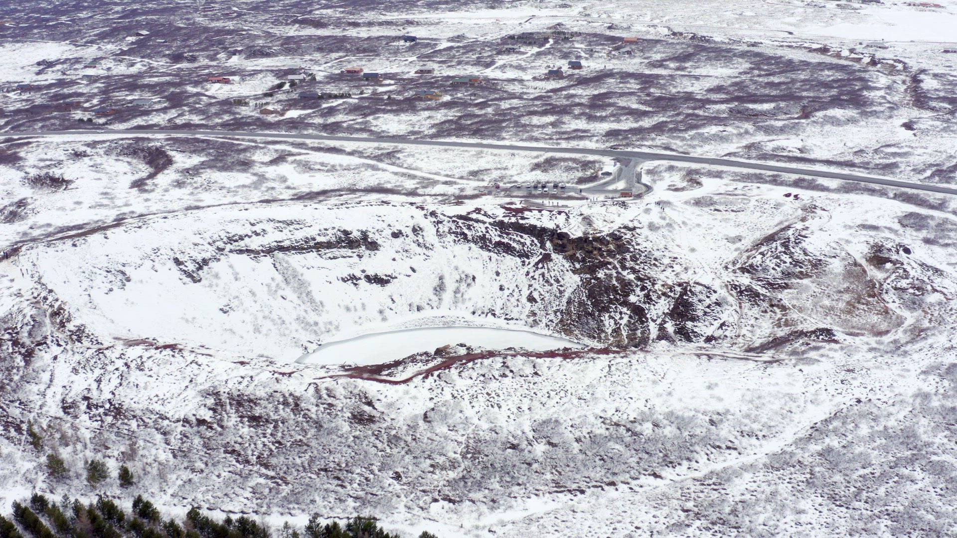 Snowy Volcanic Kerid Crater on the Golden Circle of Iceland Seen From the Air