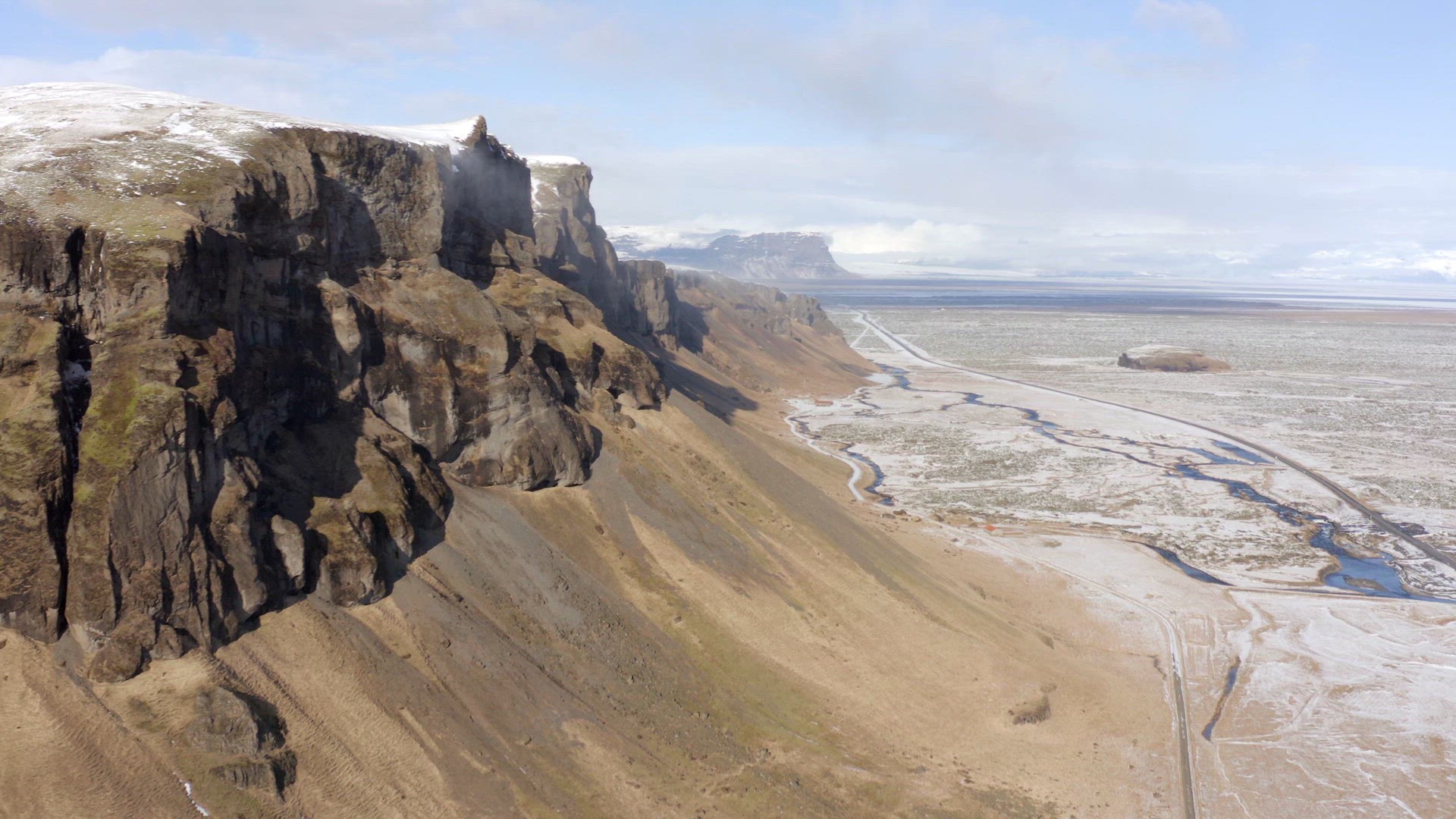 Views Across Typical Icelandic Landscapes in the Early Evening From the Air