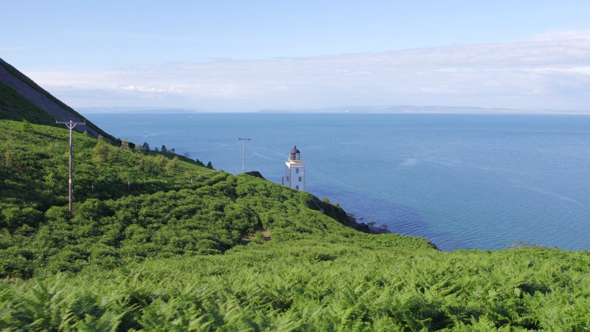 A Beautiful Square Lighthouse in the Summer