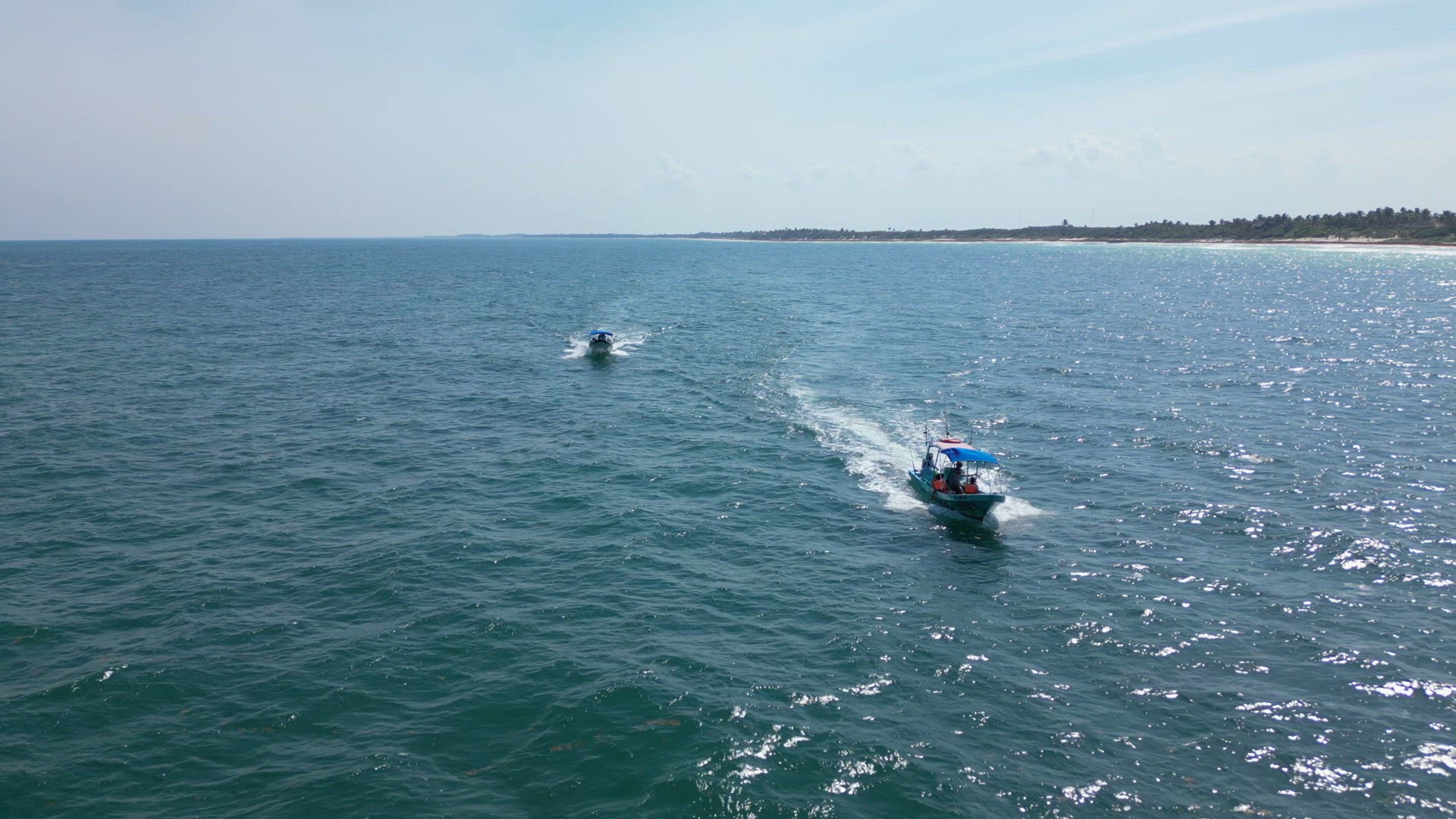 Fishing Tour Boat at Sea Taking Tourists out to Catch Fish in Mexico